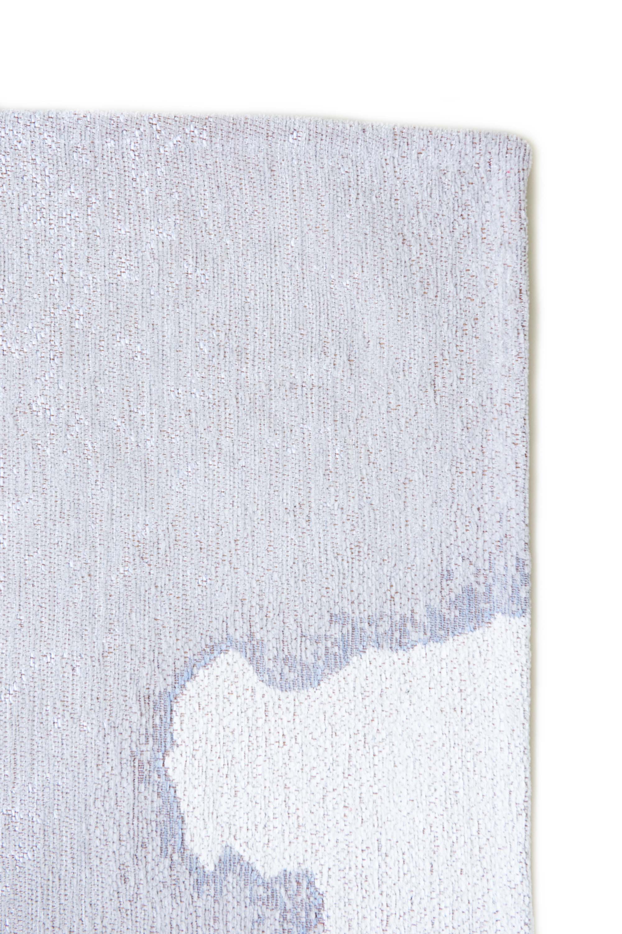 Modern rug with grey abstract shoreline pattern