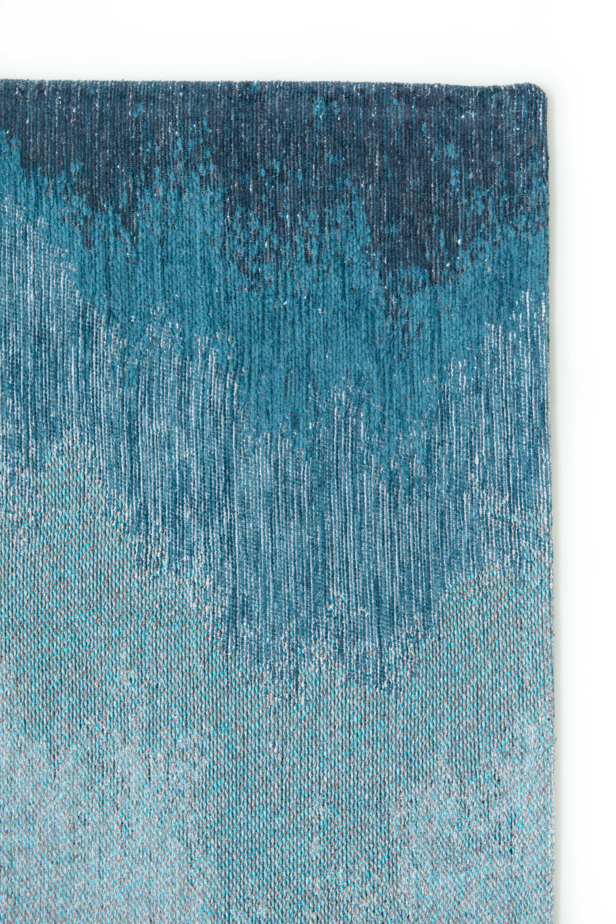 Modern rug with blue abstract shoreline pattern