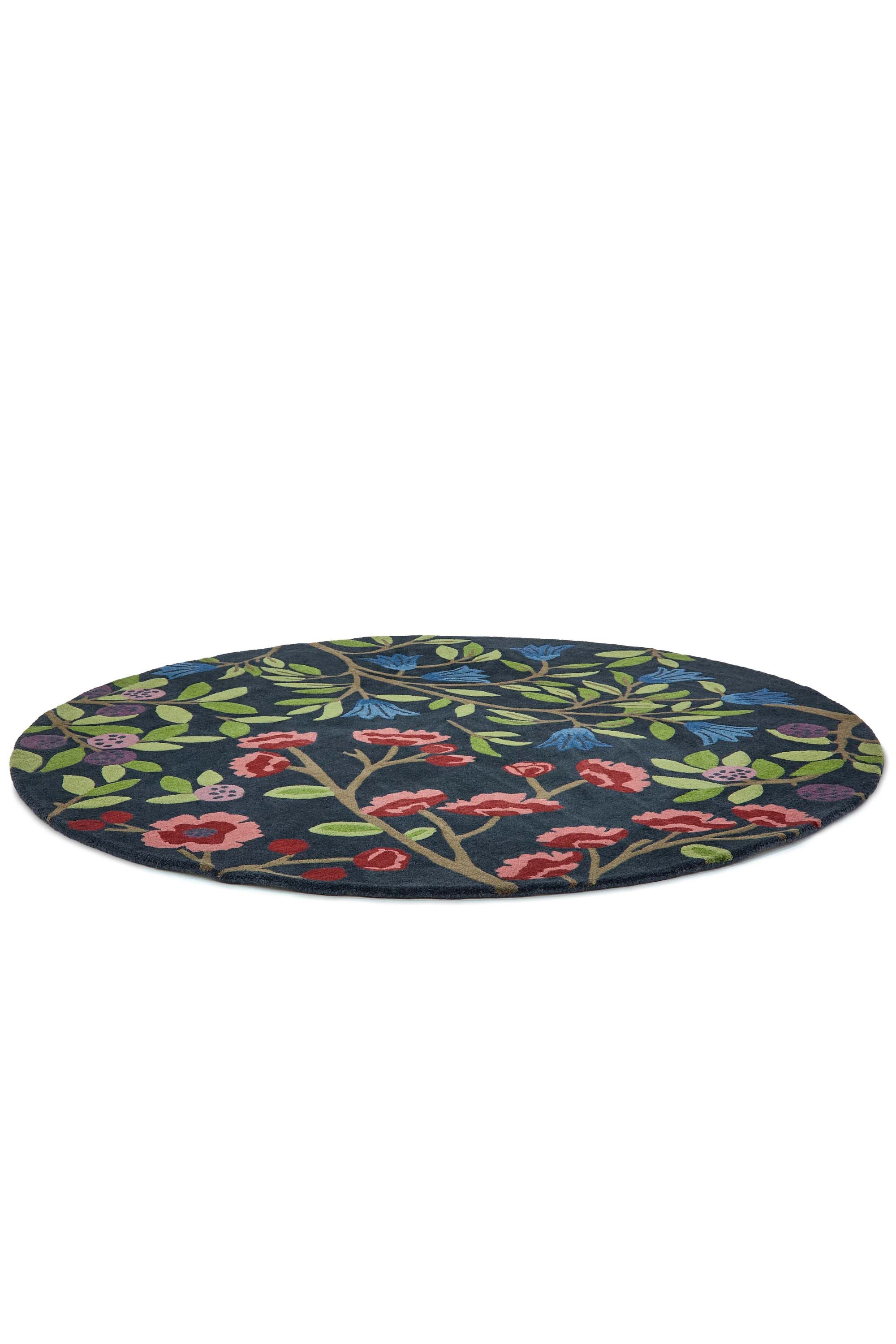 Modern circle rug with floral pattern in blue and natural tones