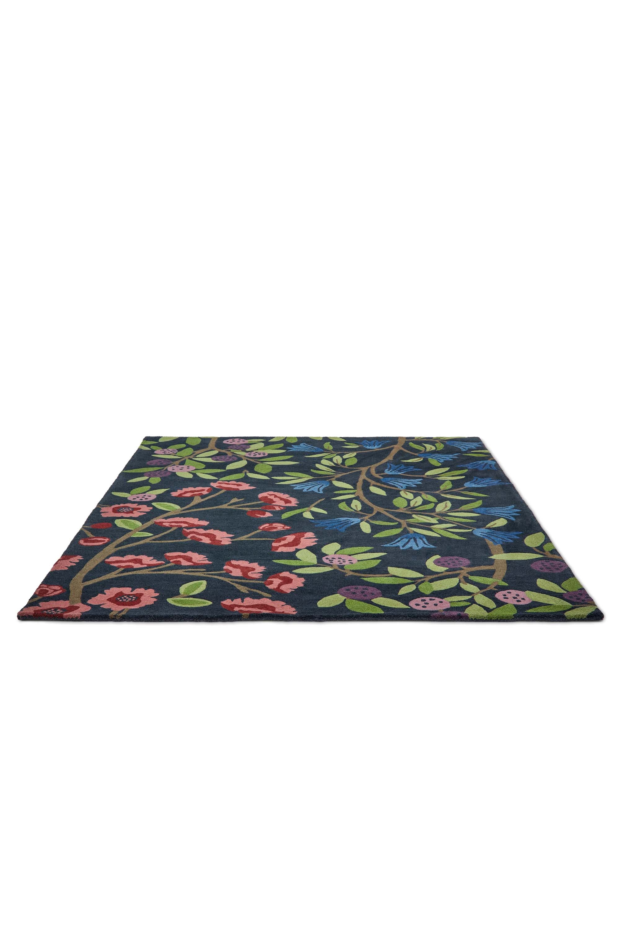 Modern rug with floral pattern in blue and natural tones