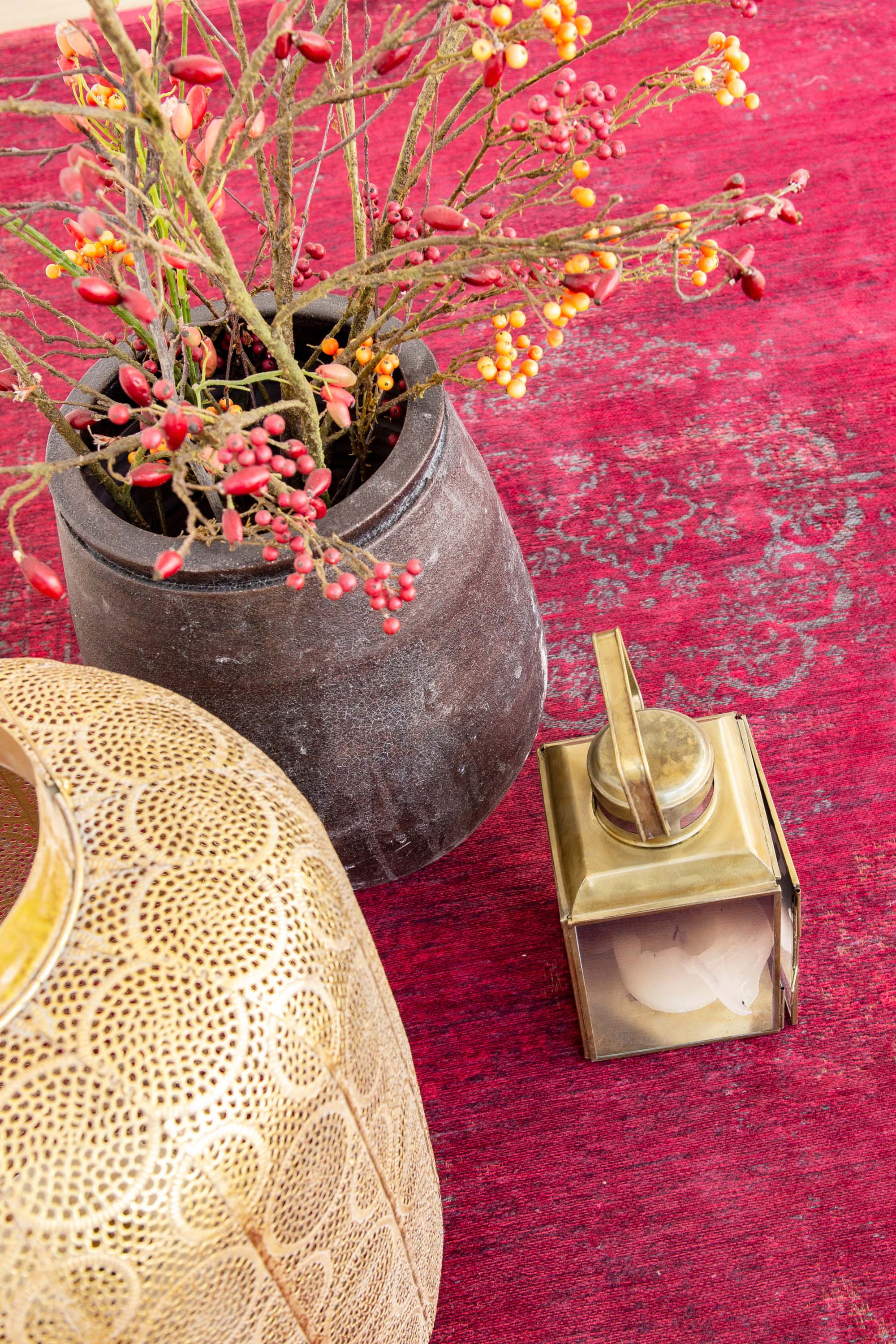 Red rug with faded persian design