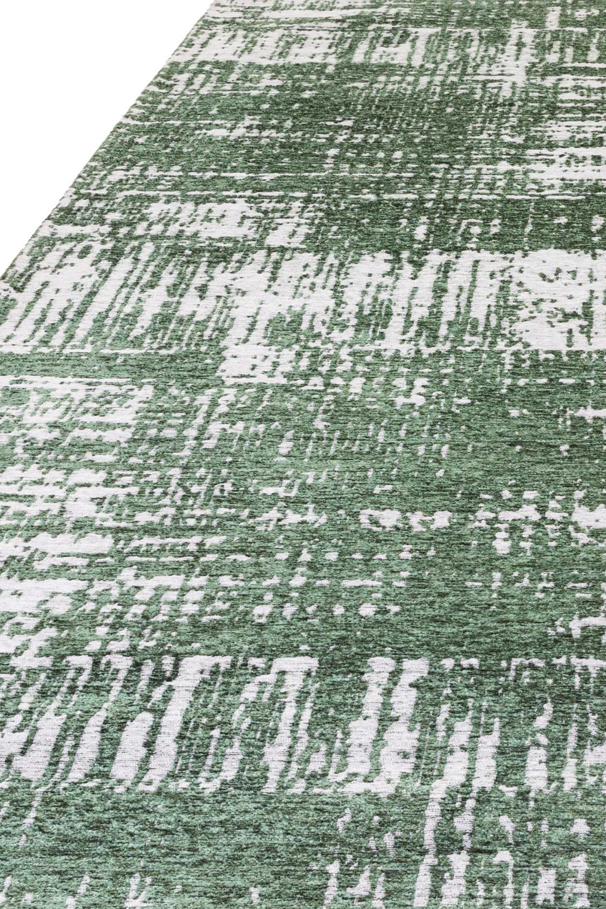 Modern green flatweave rug with abstract pattern