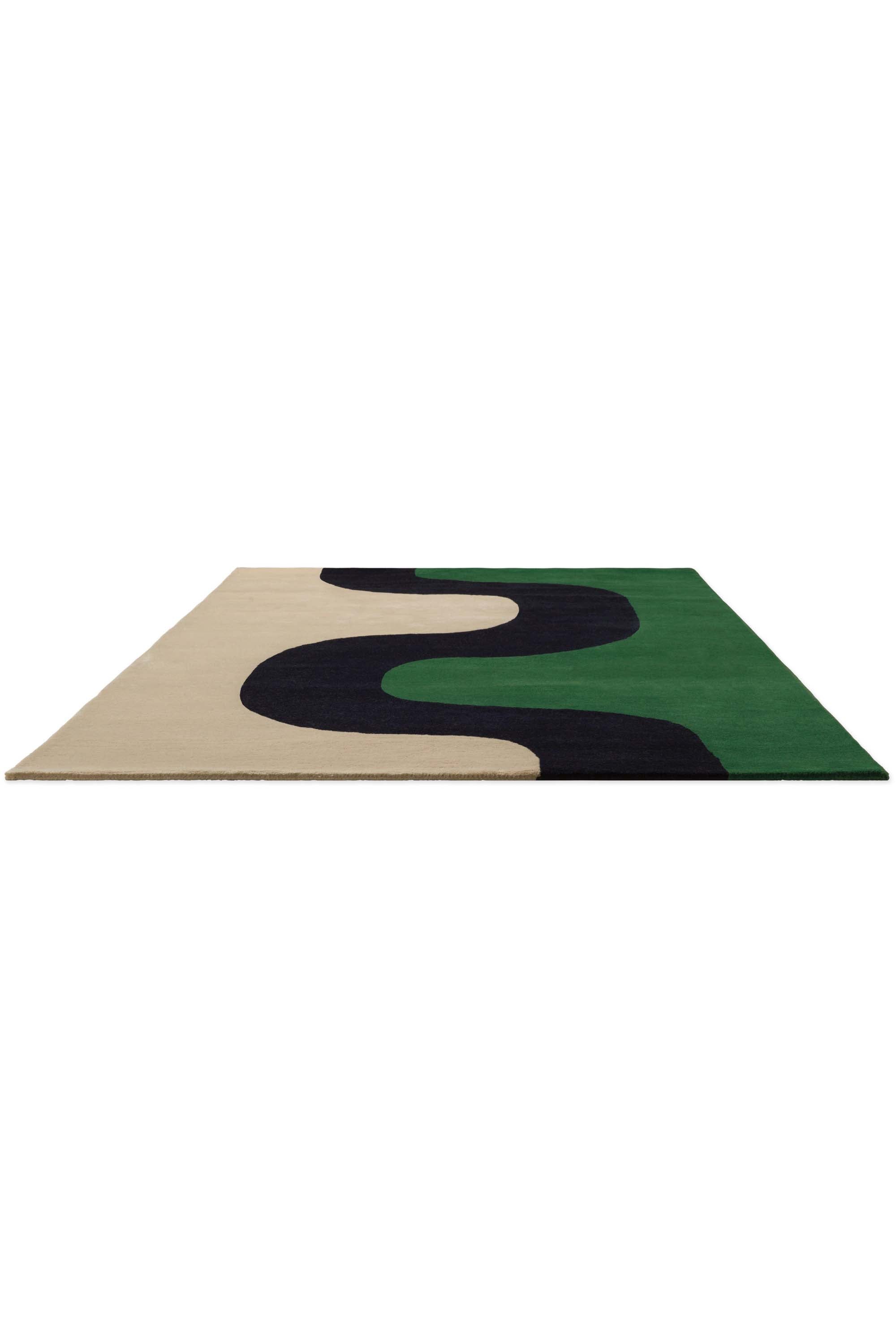 Beige and green rug with cream blue pattern