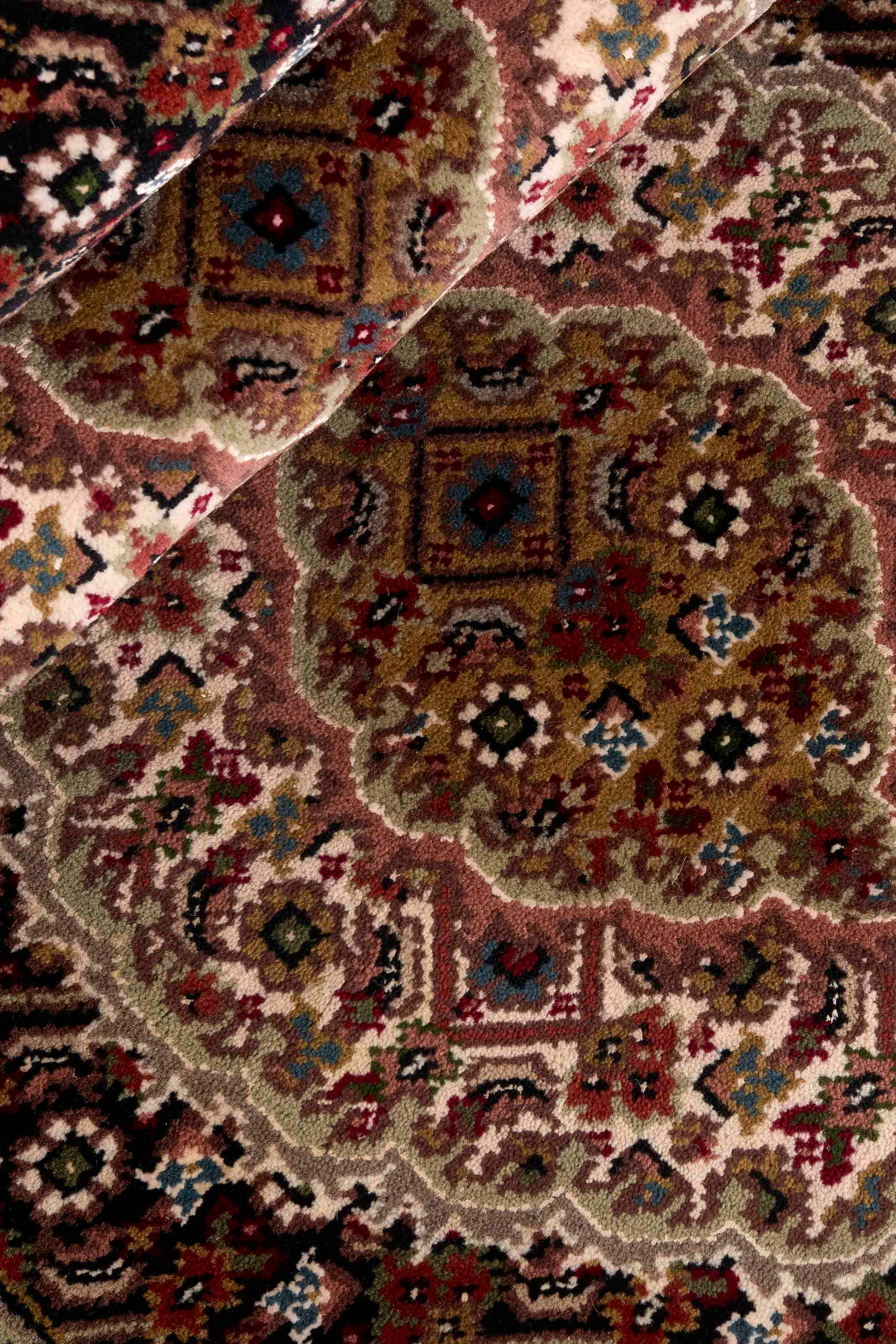 Traditional bordered Tabriz Indi runner