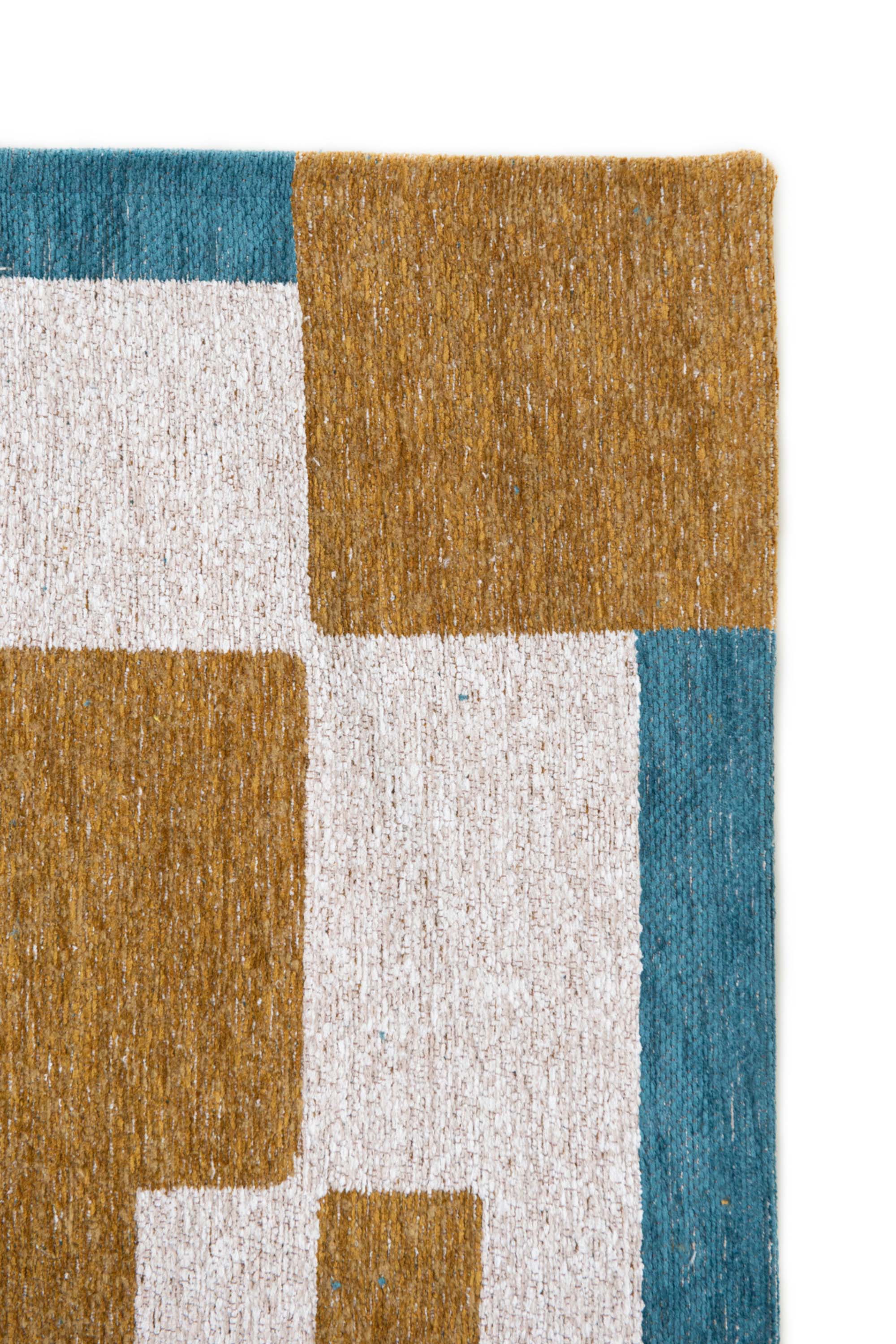 Abstract geometric rug with yellow, green, and white tones