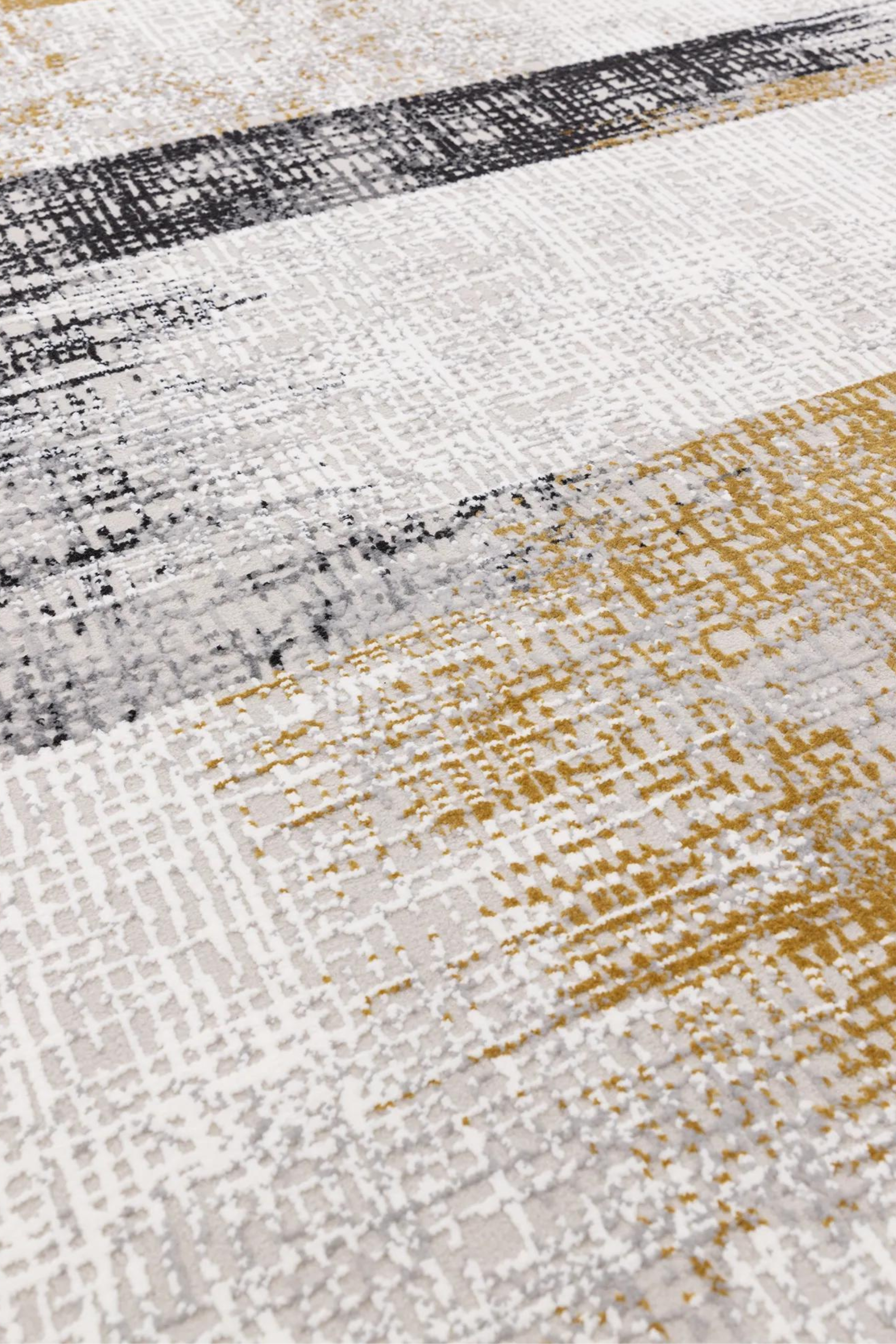 Modern flatweave rug with abstract gold design