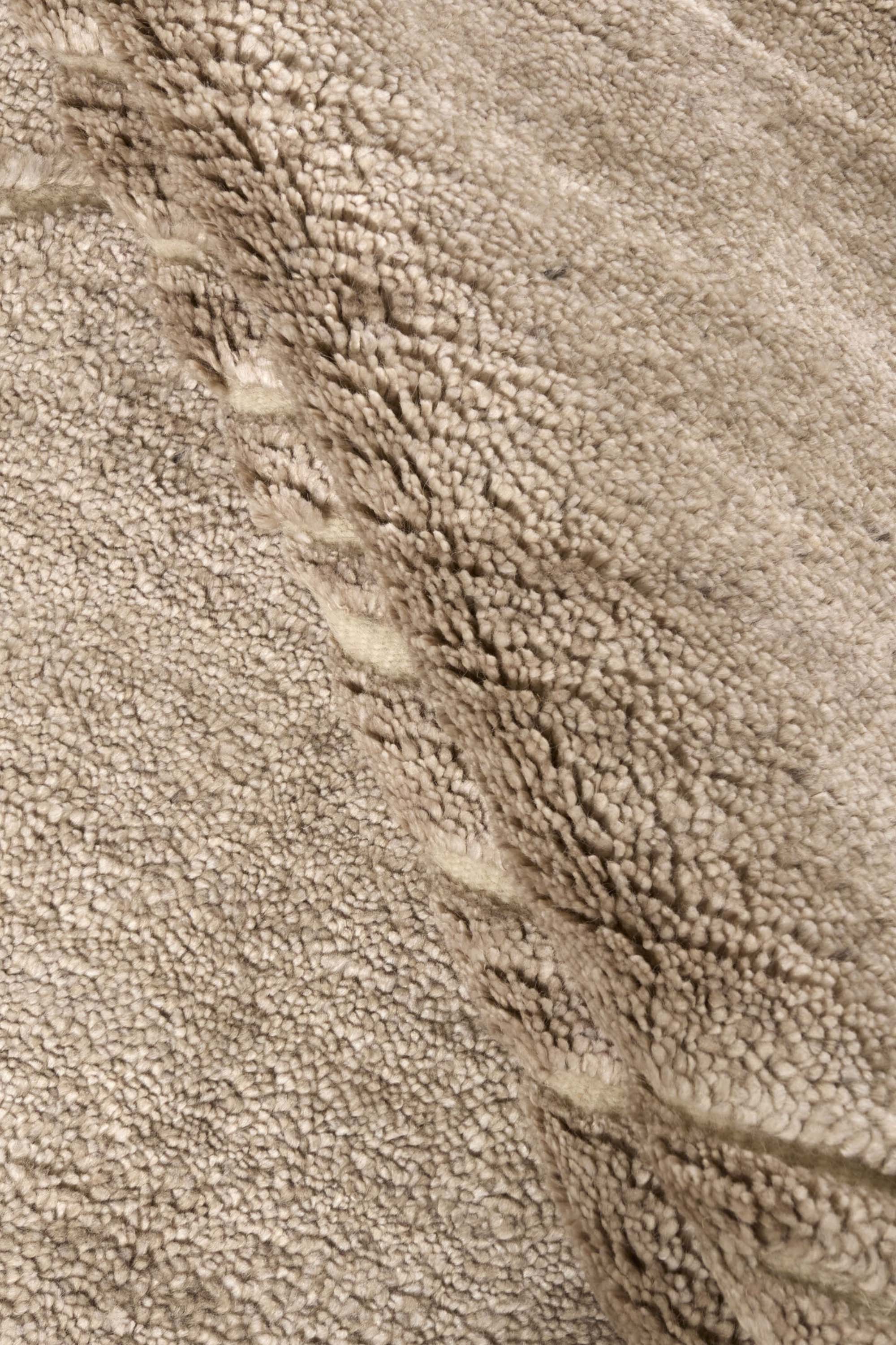 Minimal beige luxury Moroccan style rug