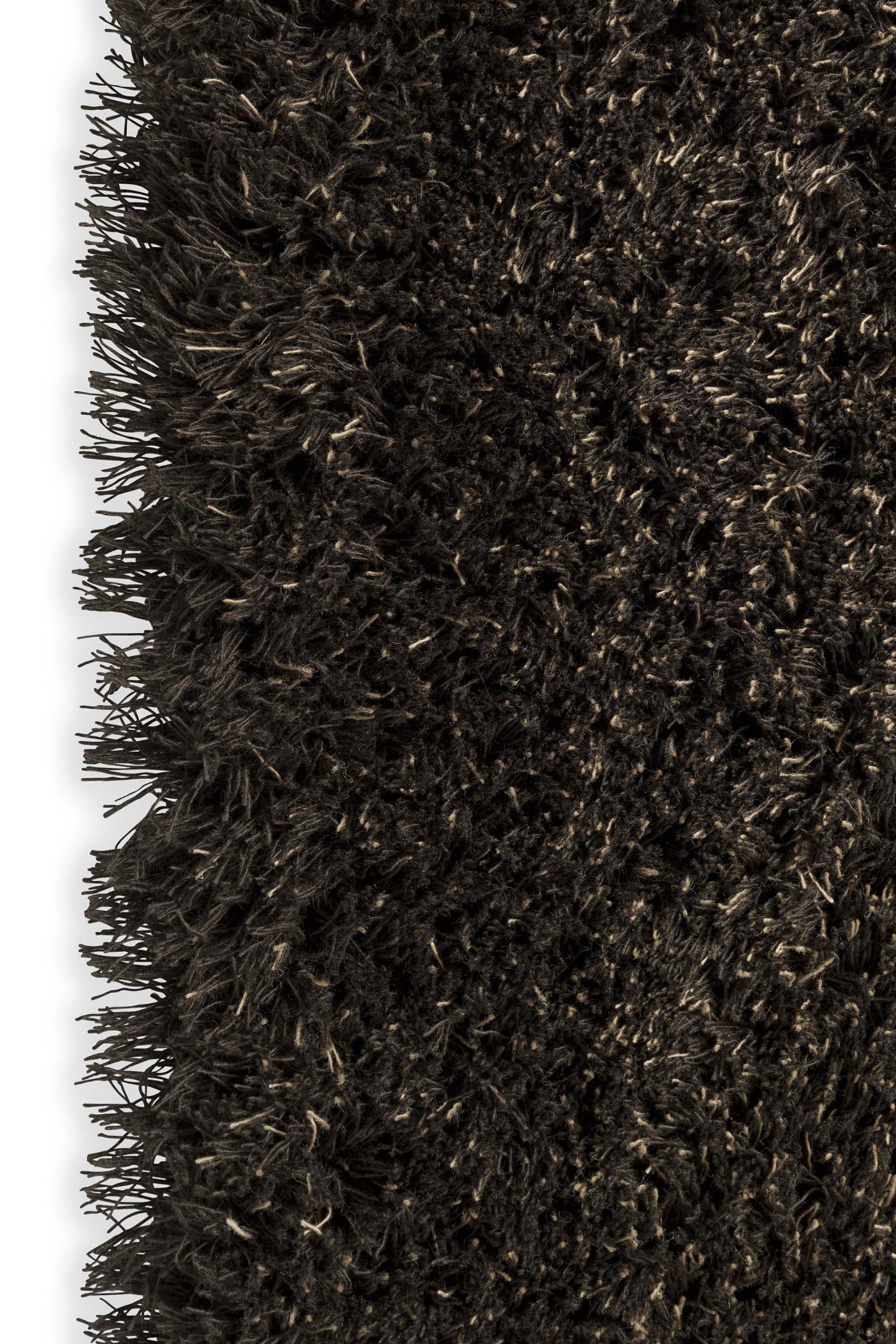 Plain brown rug with shaggy pile