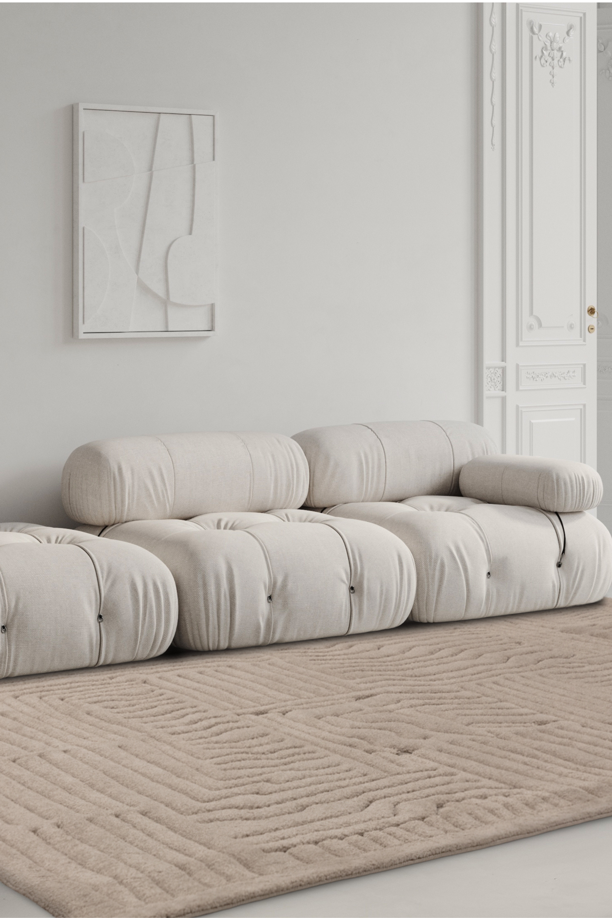 Beige rug with high-low pile and minimal geometric pattern