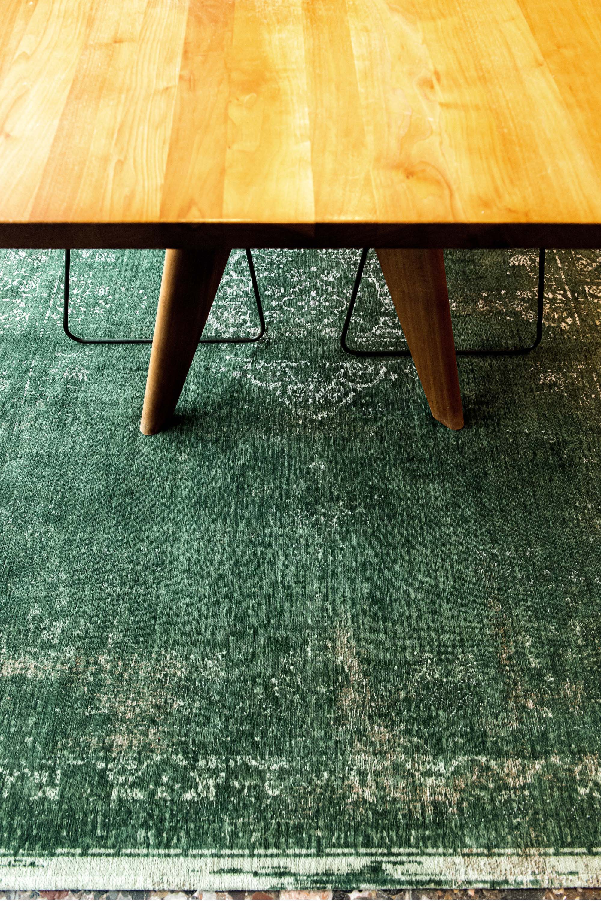 green vintage style rug