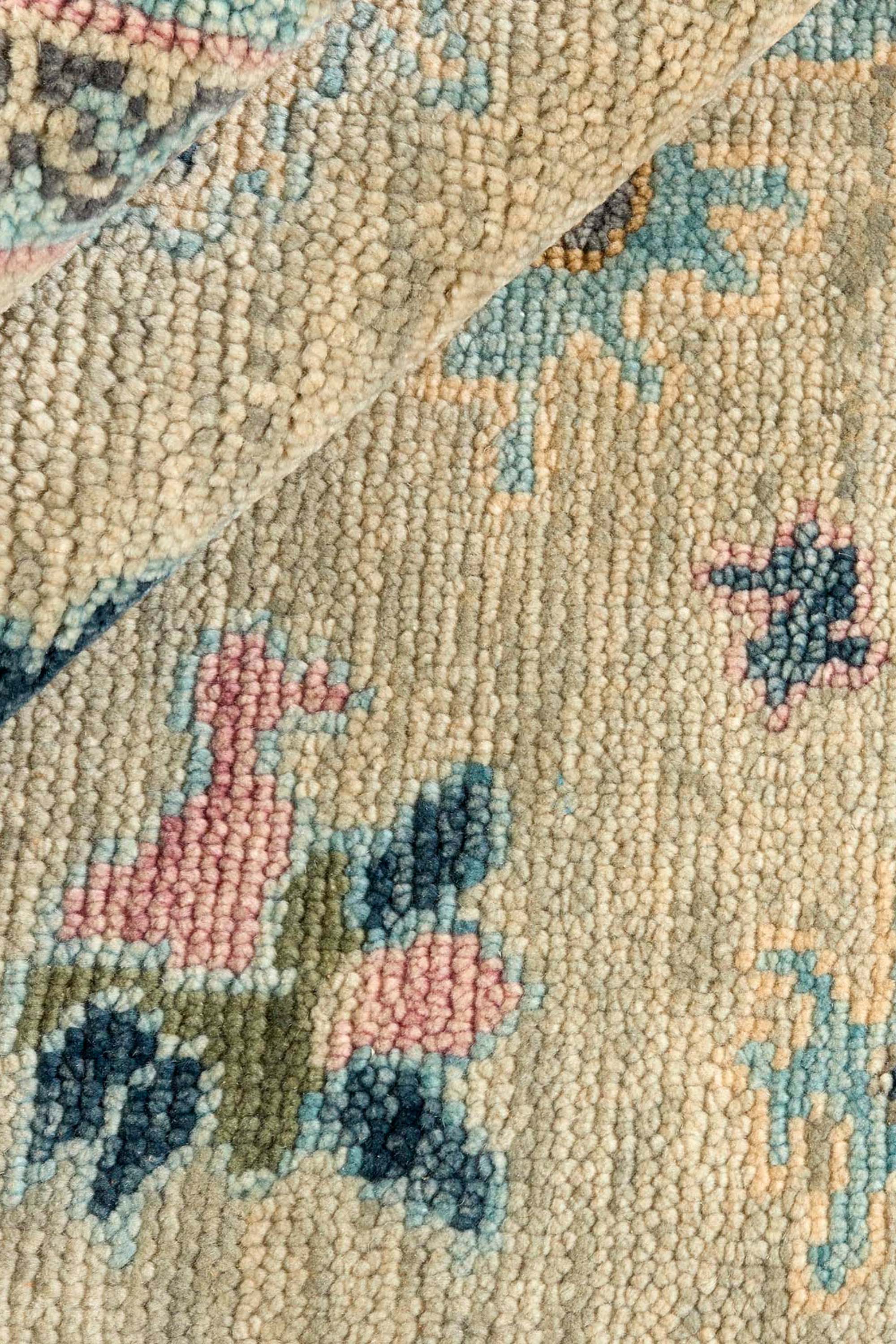 Traditional multicoloured Oushak rug with blue border