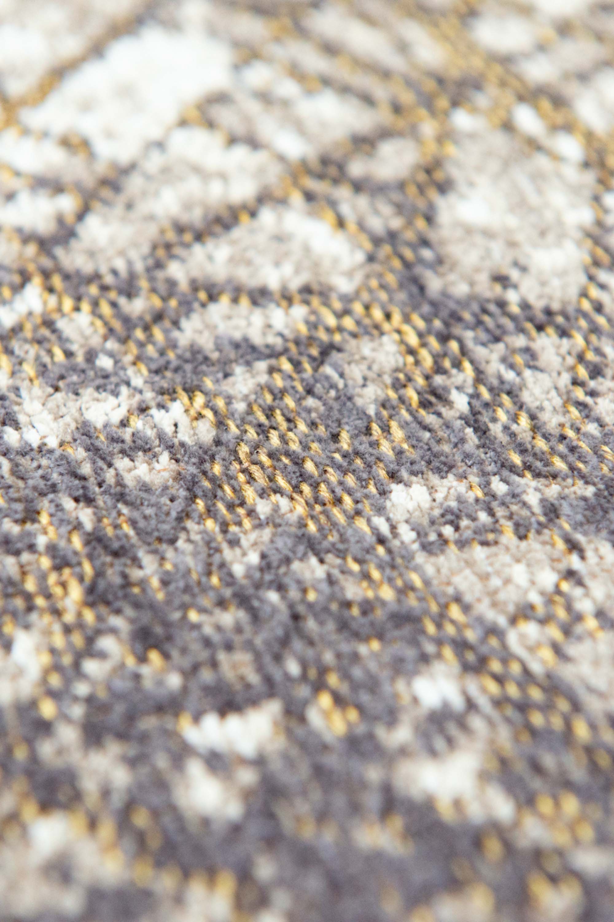 Silver abstract circle rug with a pattern inspired by the map of Paris