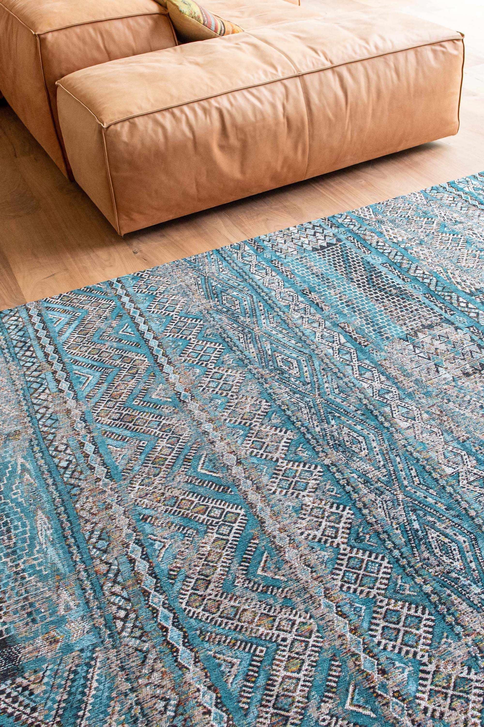 blue rug with a moroccan geometric pattern