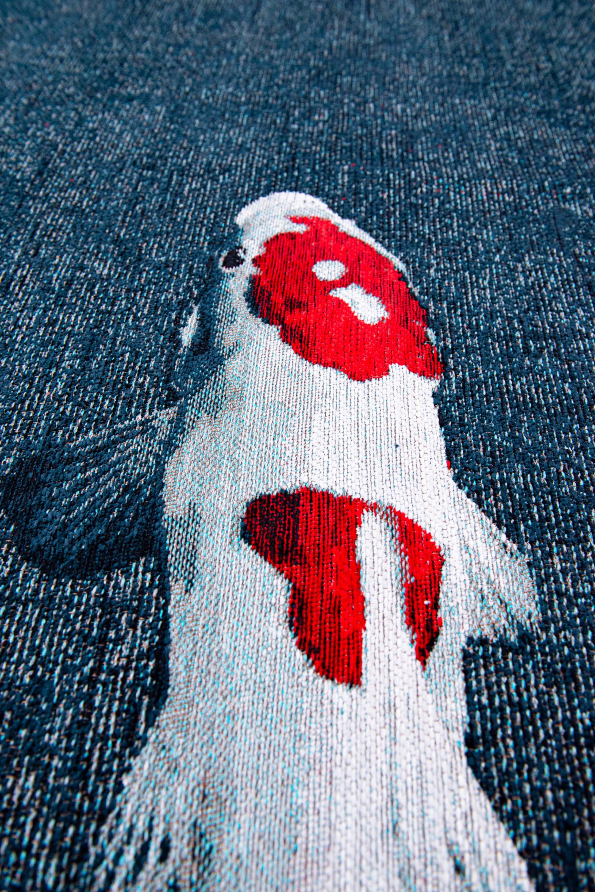 Modern navy rug with detailed koi fish print