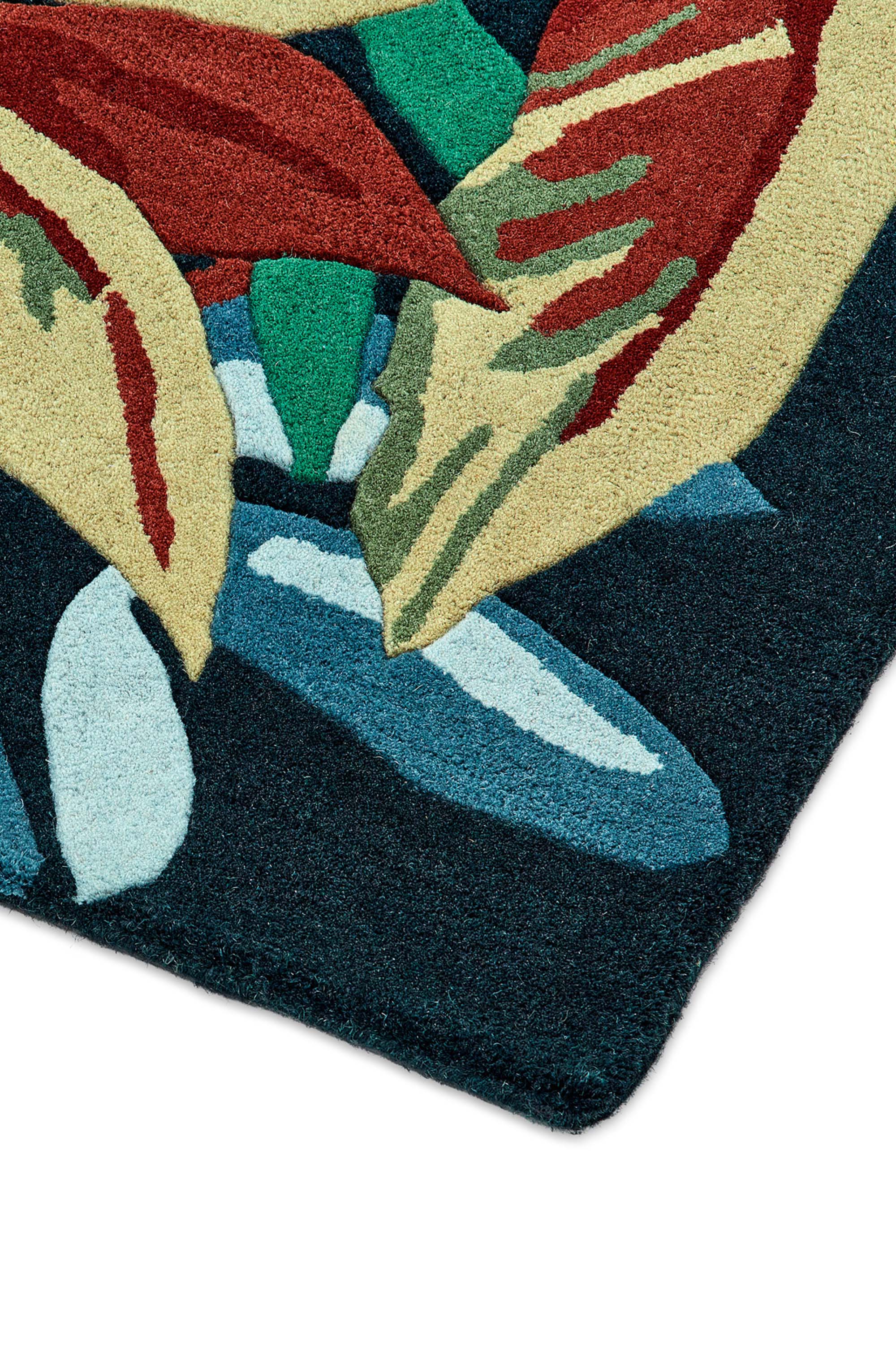 Floral rug with extruding pattern in blue and natural tones