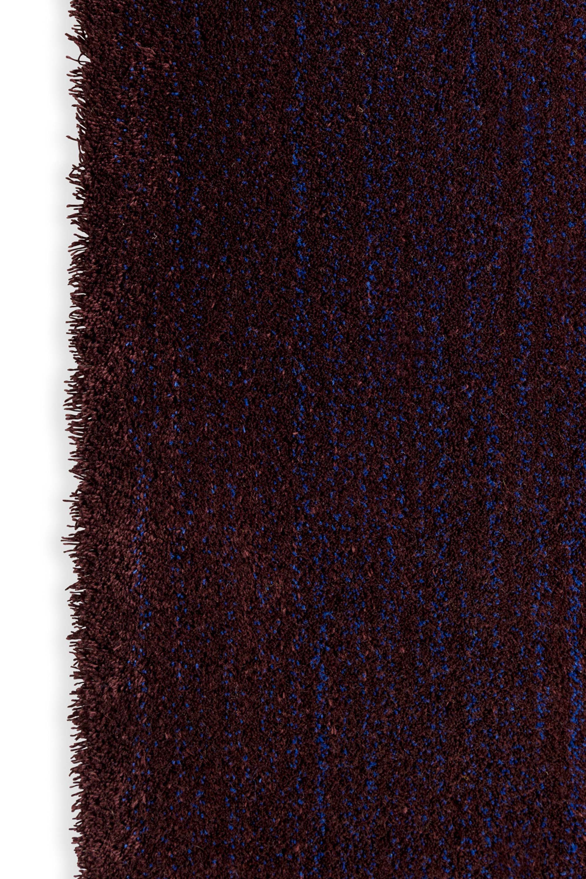 Plain blue rug with textured pile