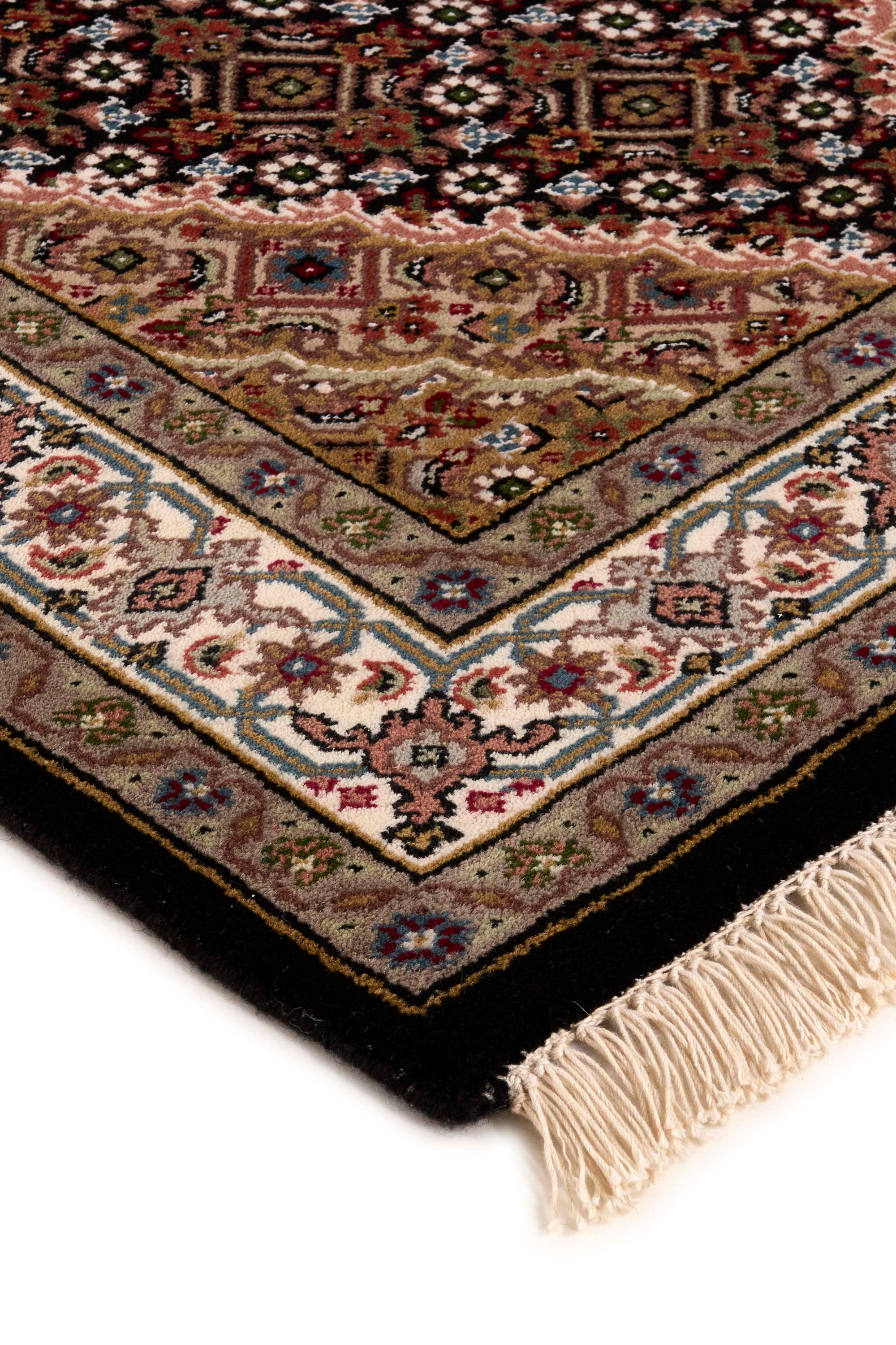 Traditional bordered Tabriz Indi runner