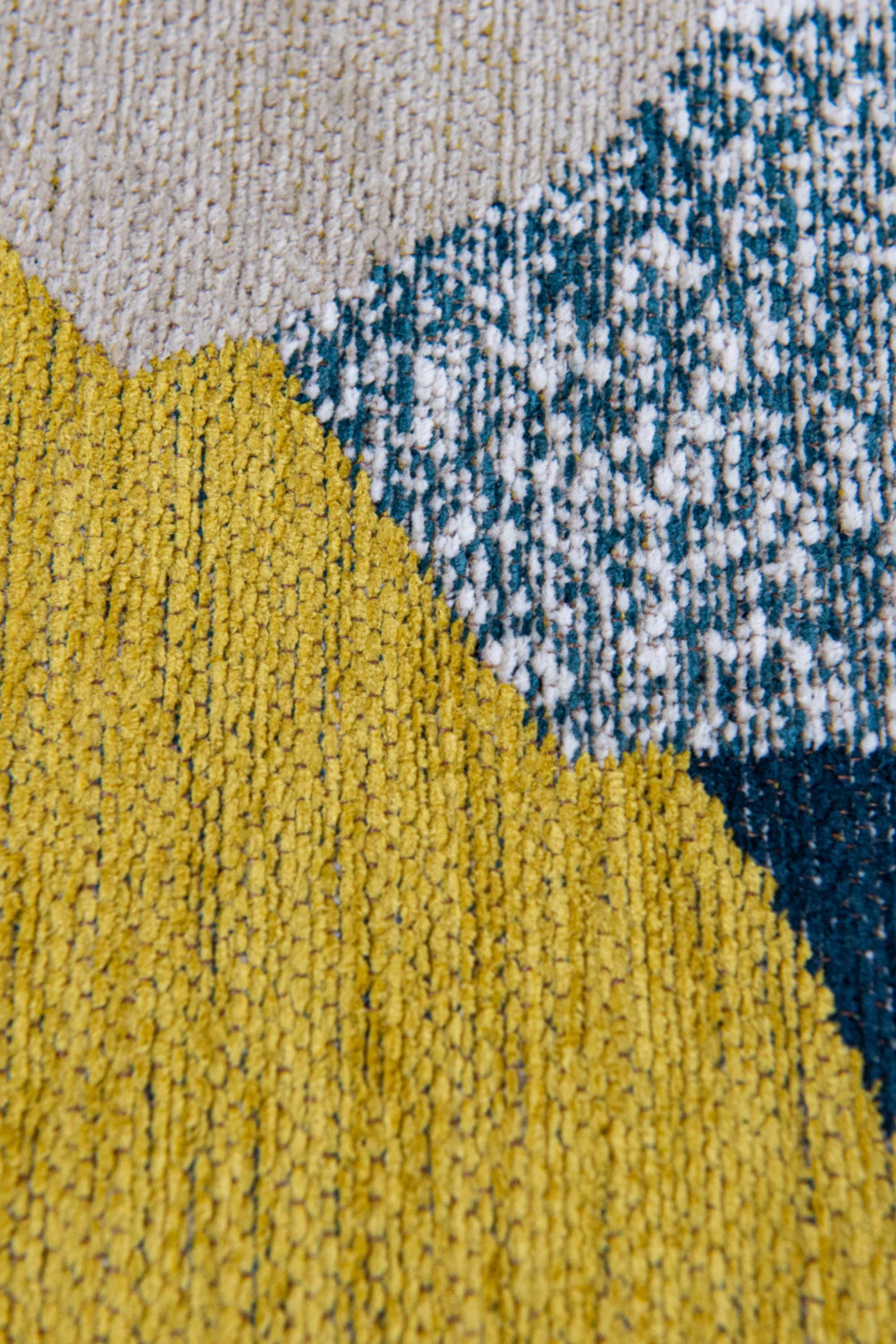 Modern rug with blue and yellow abstract pattern