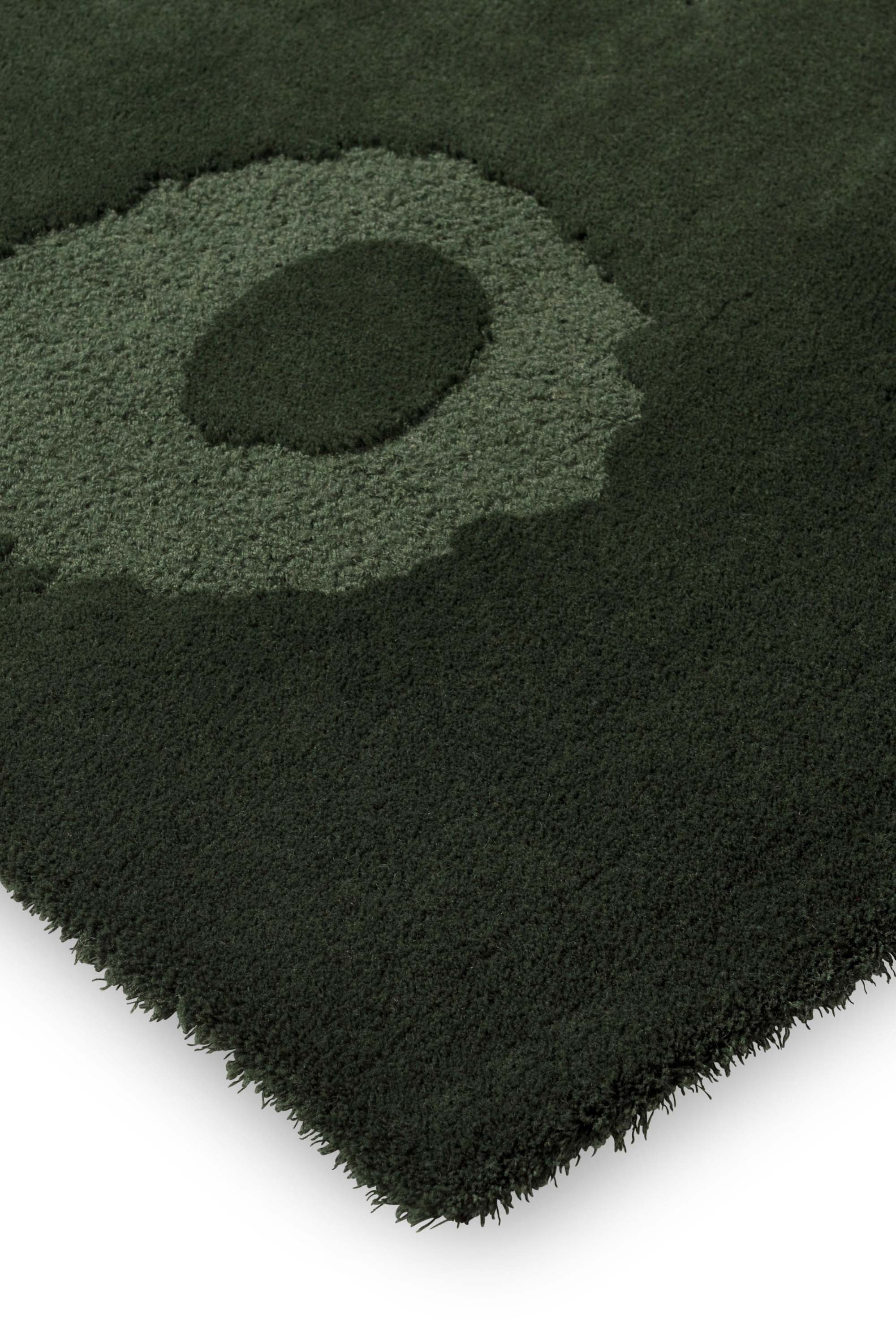 Dark green patterned floral rug