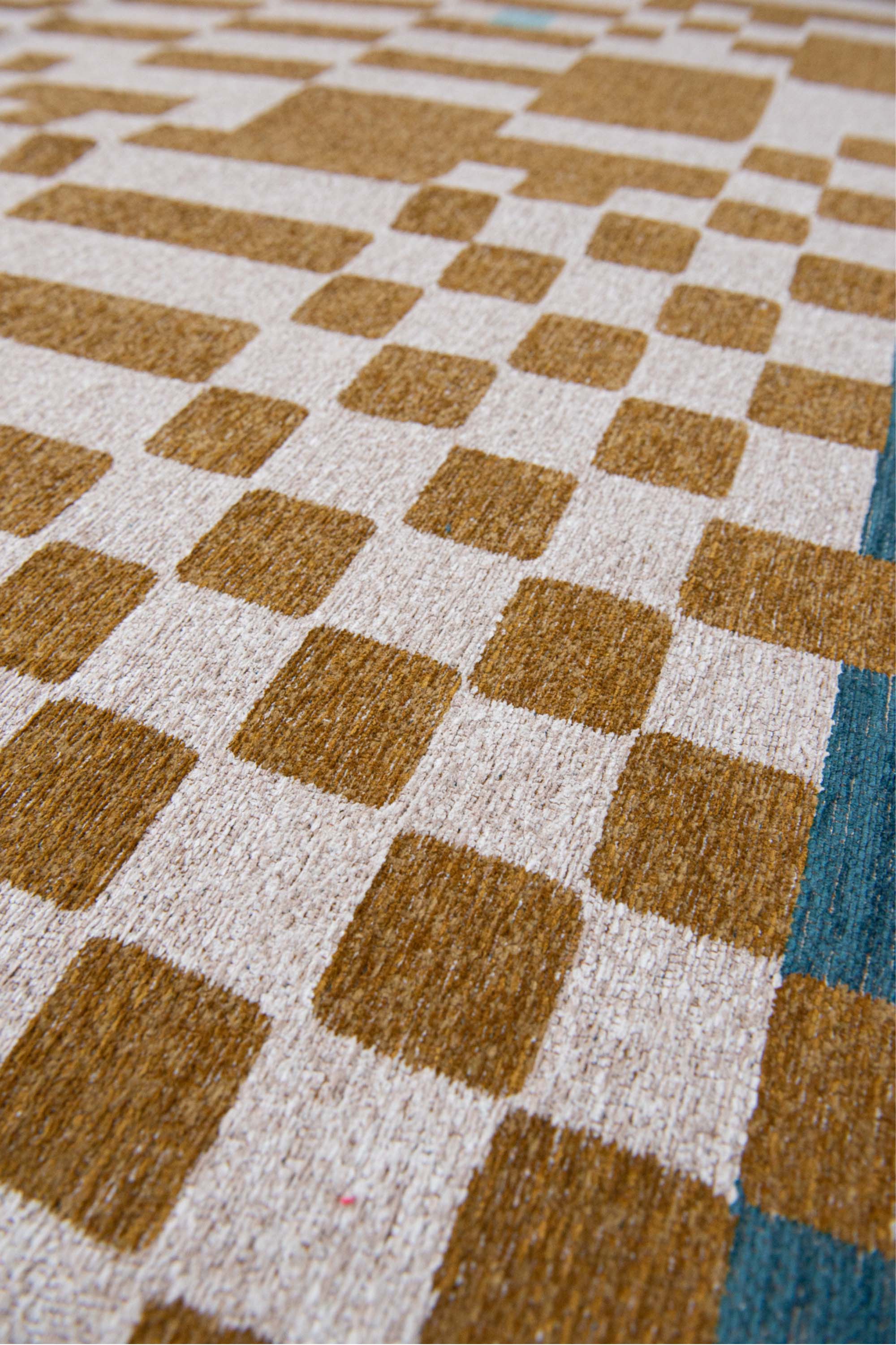 Abstract geometric rug with yellow, green, and white tones