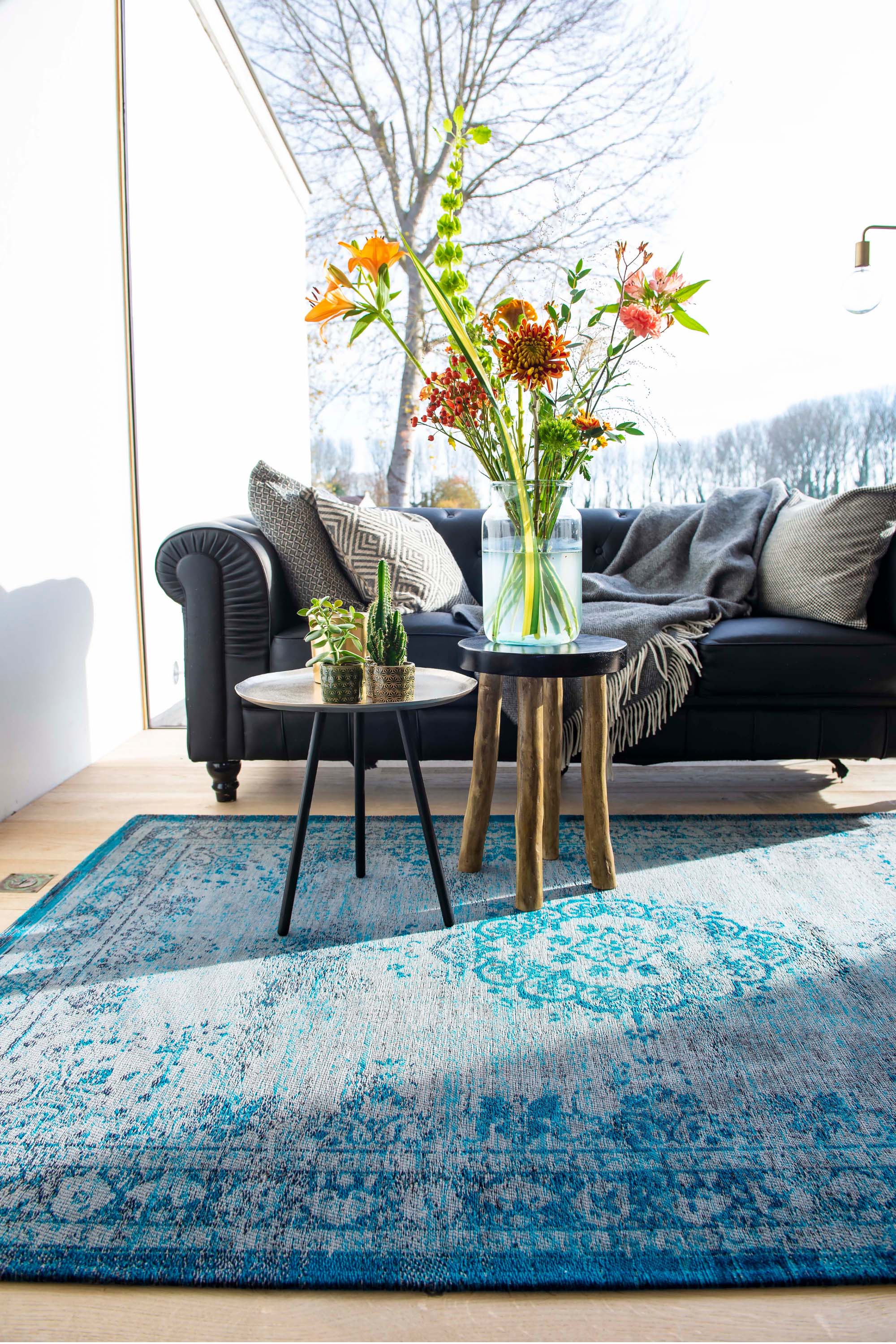 Grey and blue flatweave rug with faded persian design