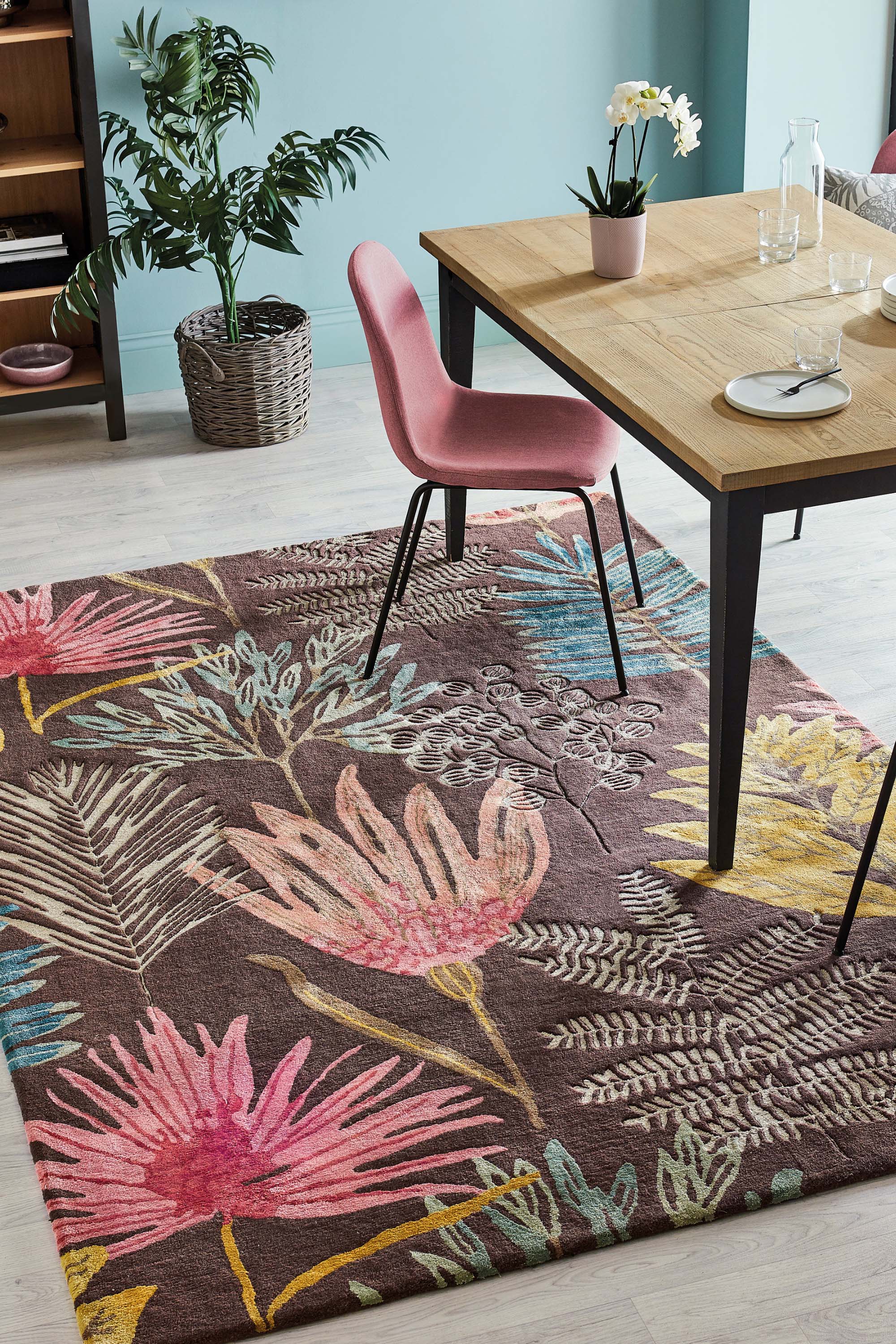 Harlequin rug with a multicolour floral pattern