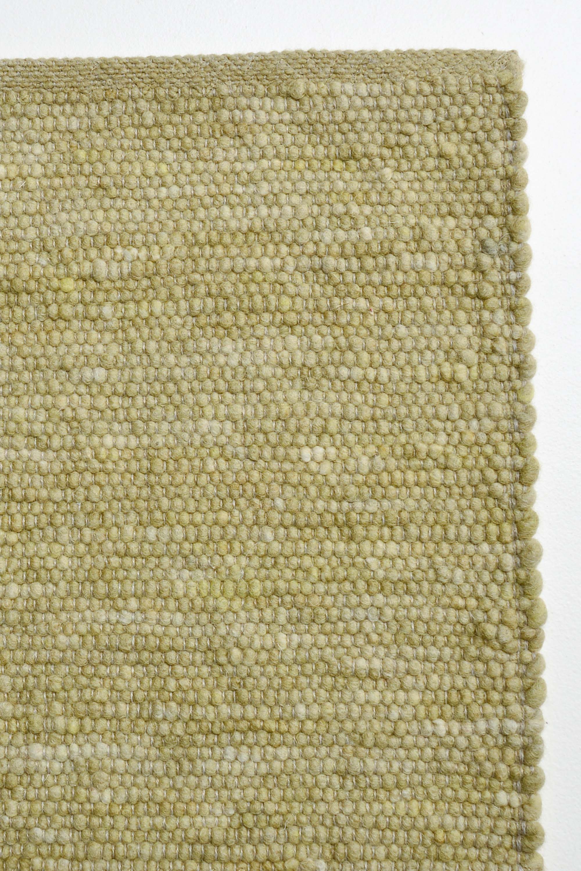 Green luxury plain handwoven rug