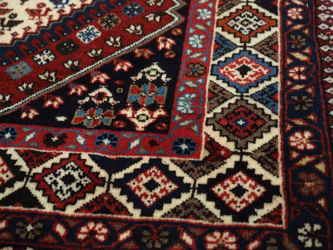 authentic multicolour persian rug with a traditional tile pattern