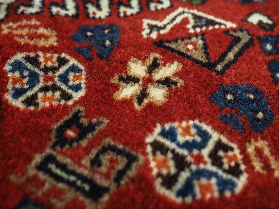 authentic multicolour persian rug with a traditional tile pattern