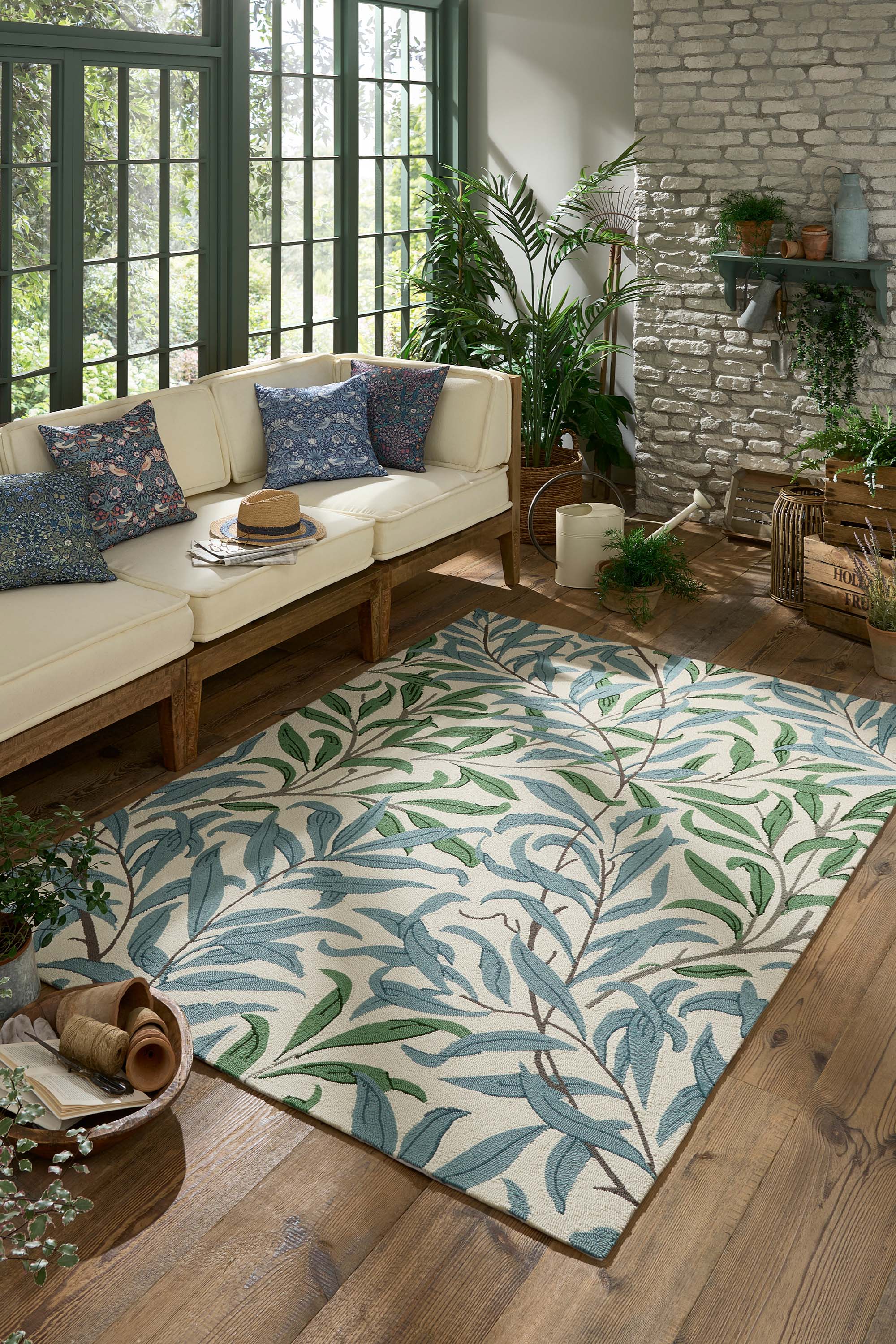 blue indoor/outdoor rug with floral pattern