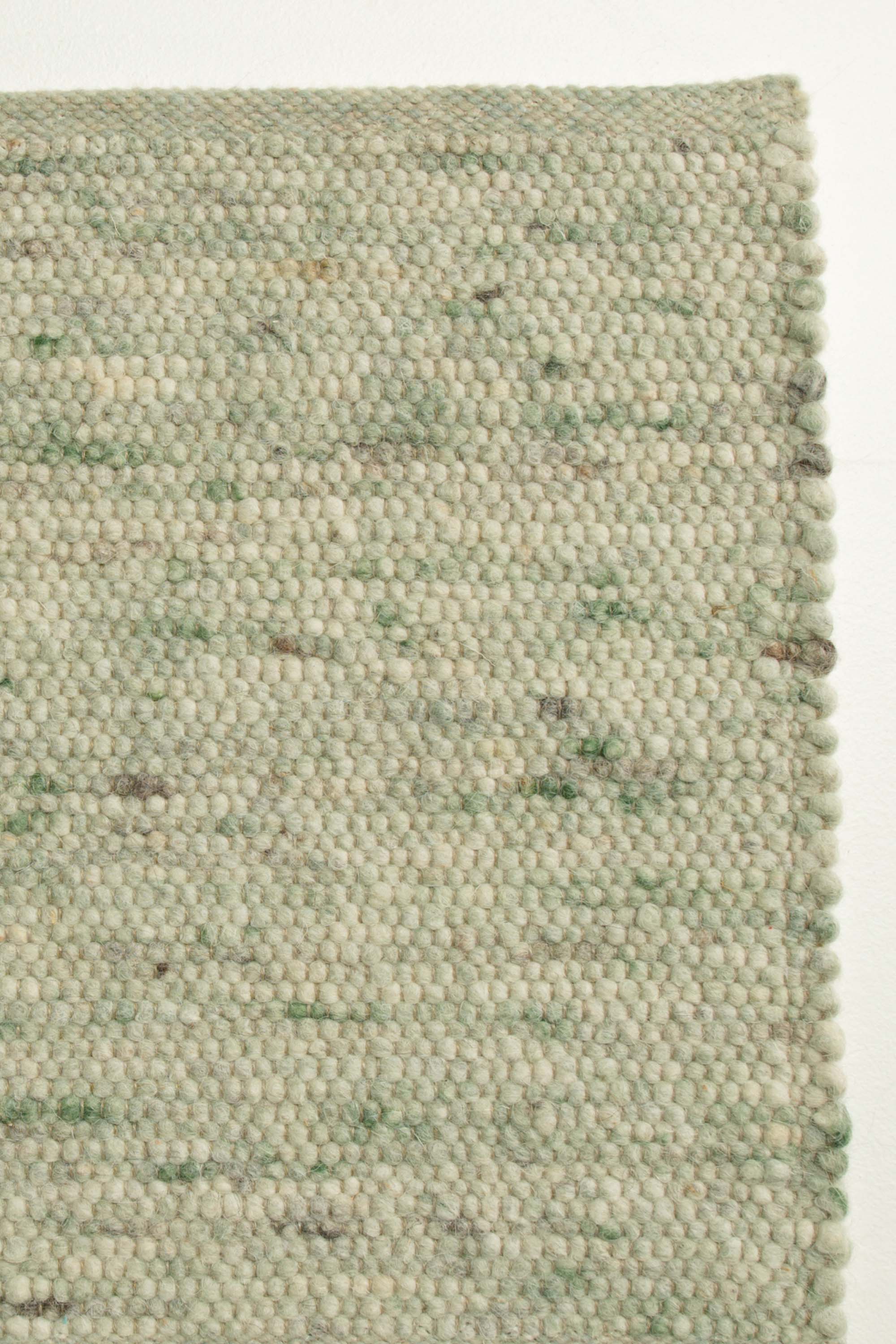 Green luxury plain handwoven rug
