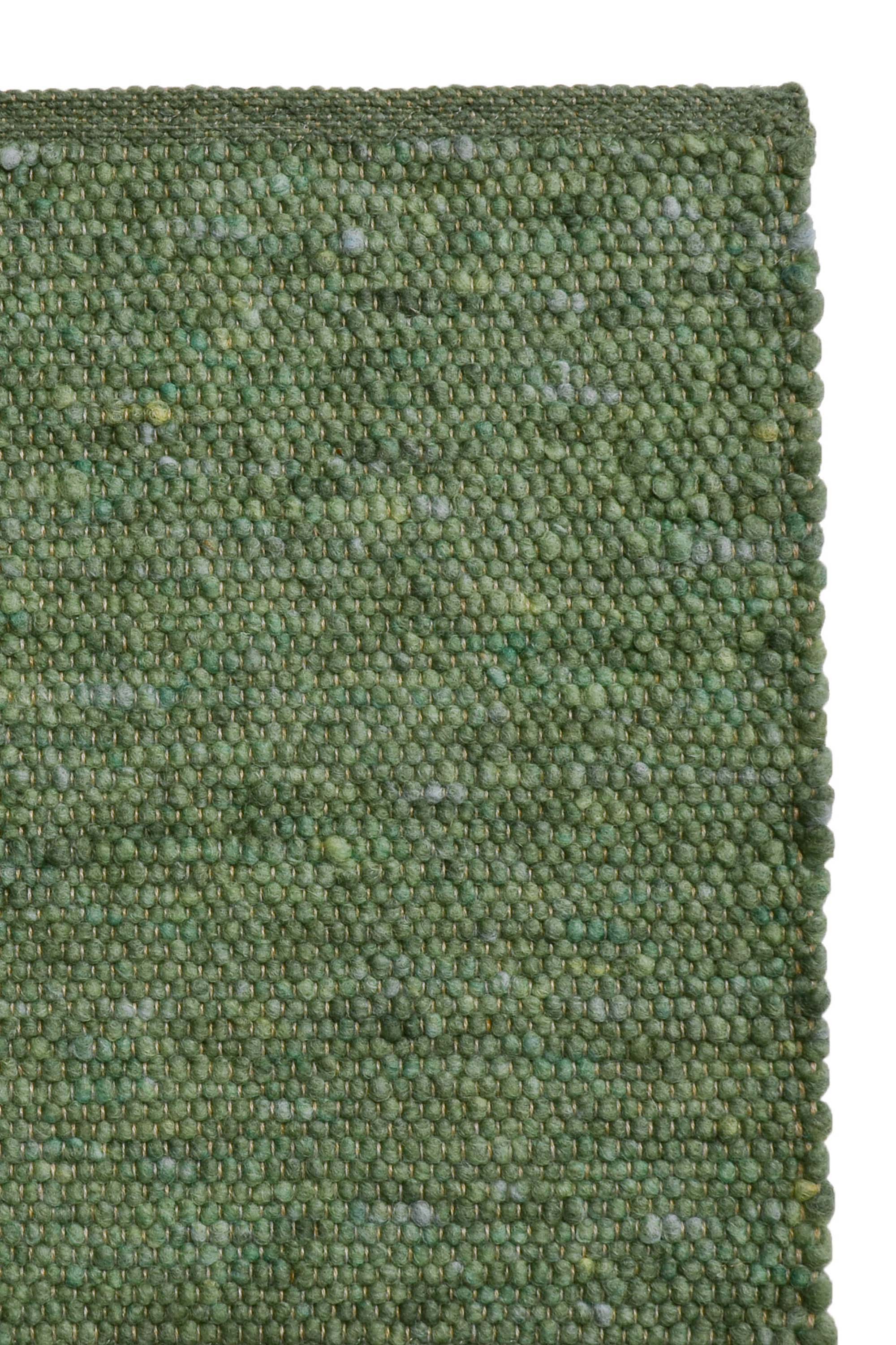 Green luxury plain handwoven rug