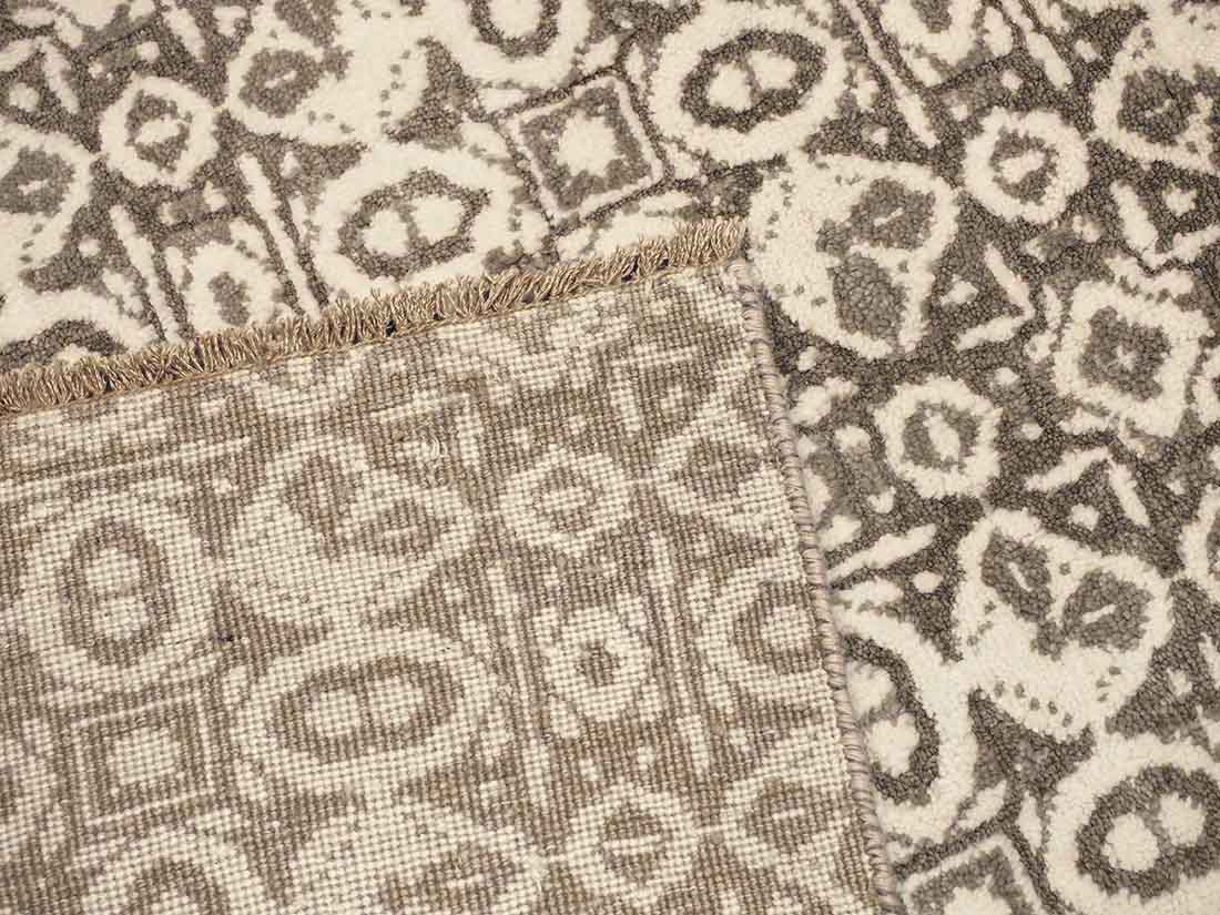 Authentic oriental rug with a damask pattern in beige