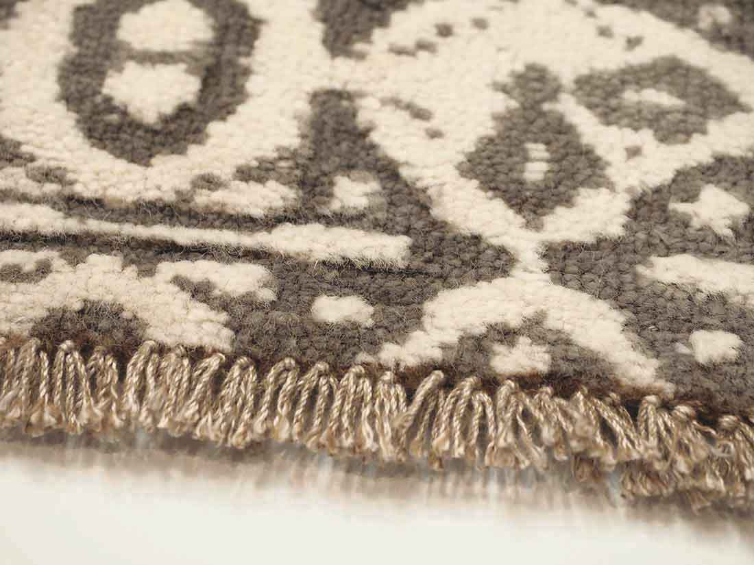 Authentic oriental rug with a damask pattern in beige