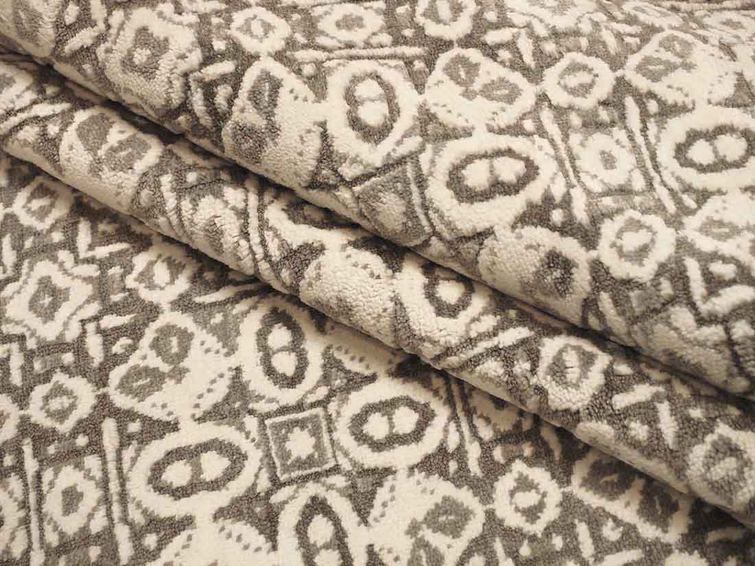 Authentic oriental rug with a damask pattern in beige