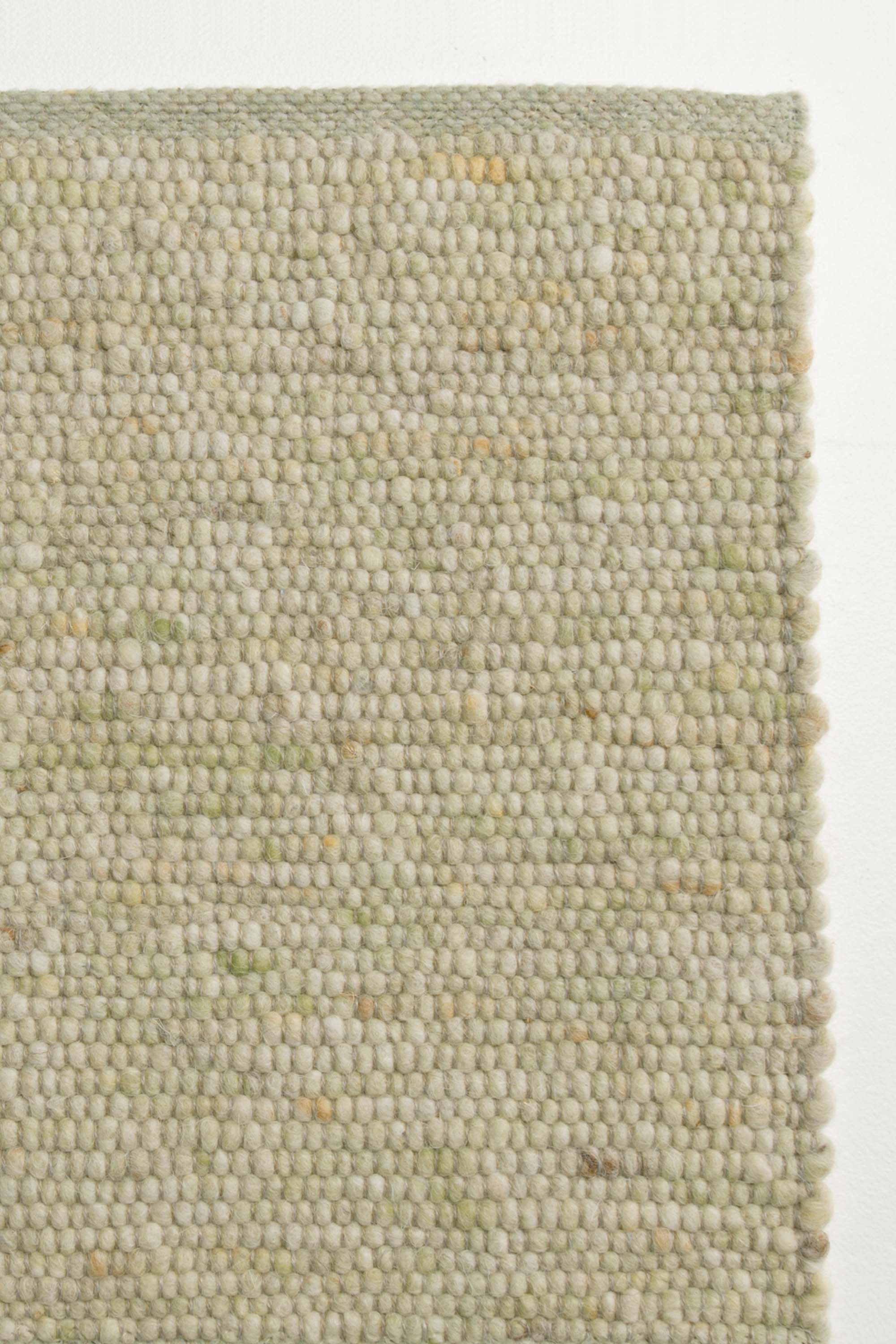Green luxury plain handwoven rug