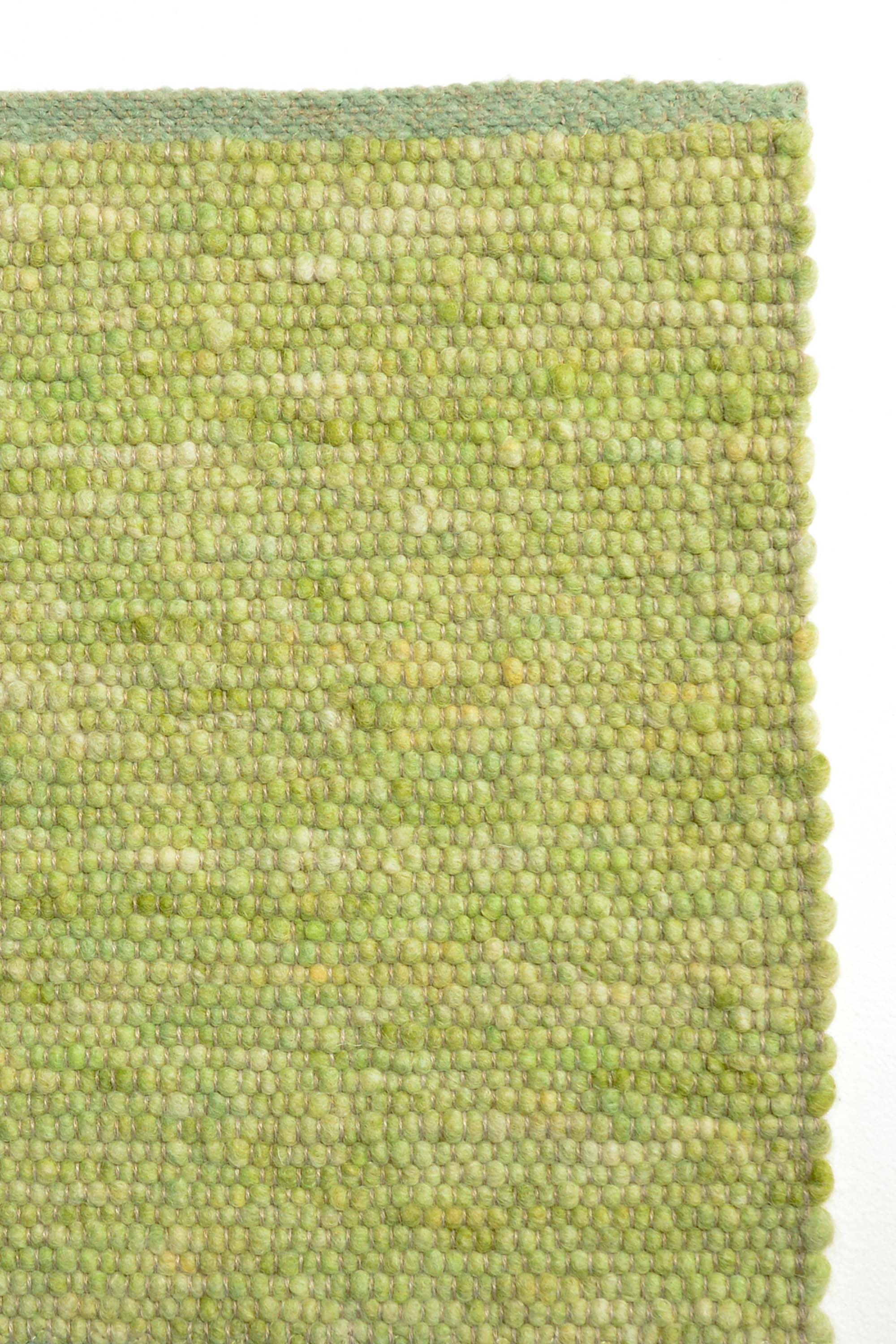 Green luxury plain handwoven rug