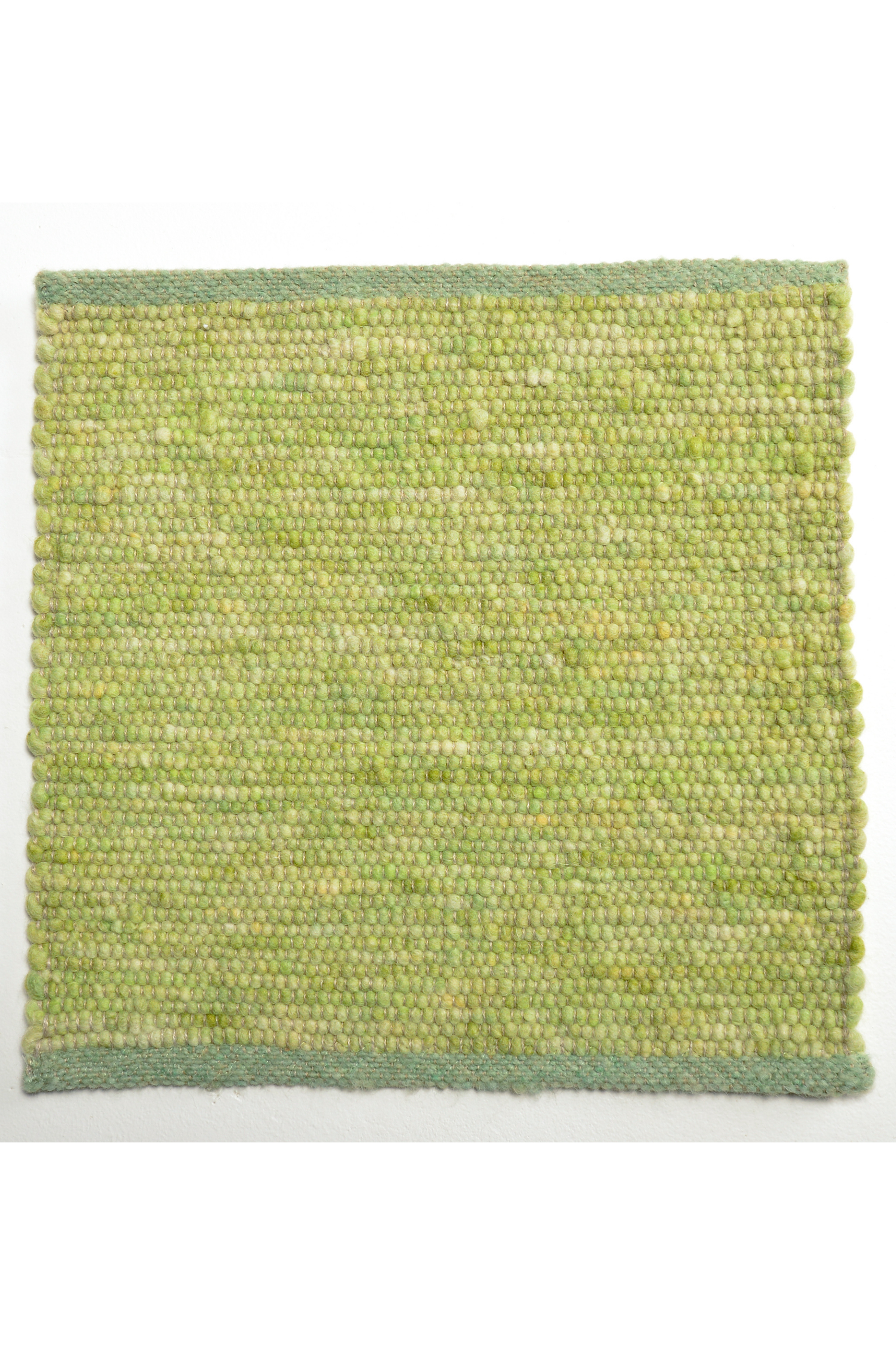 Green luxury plain handwoven rug