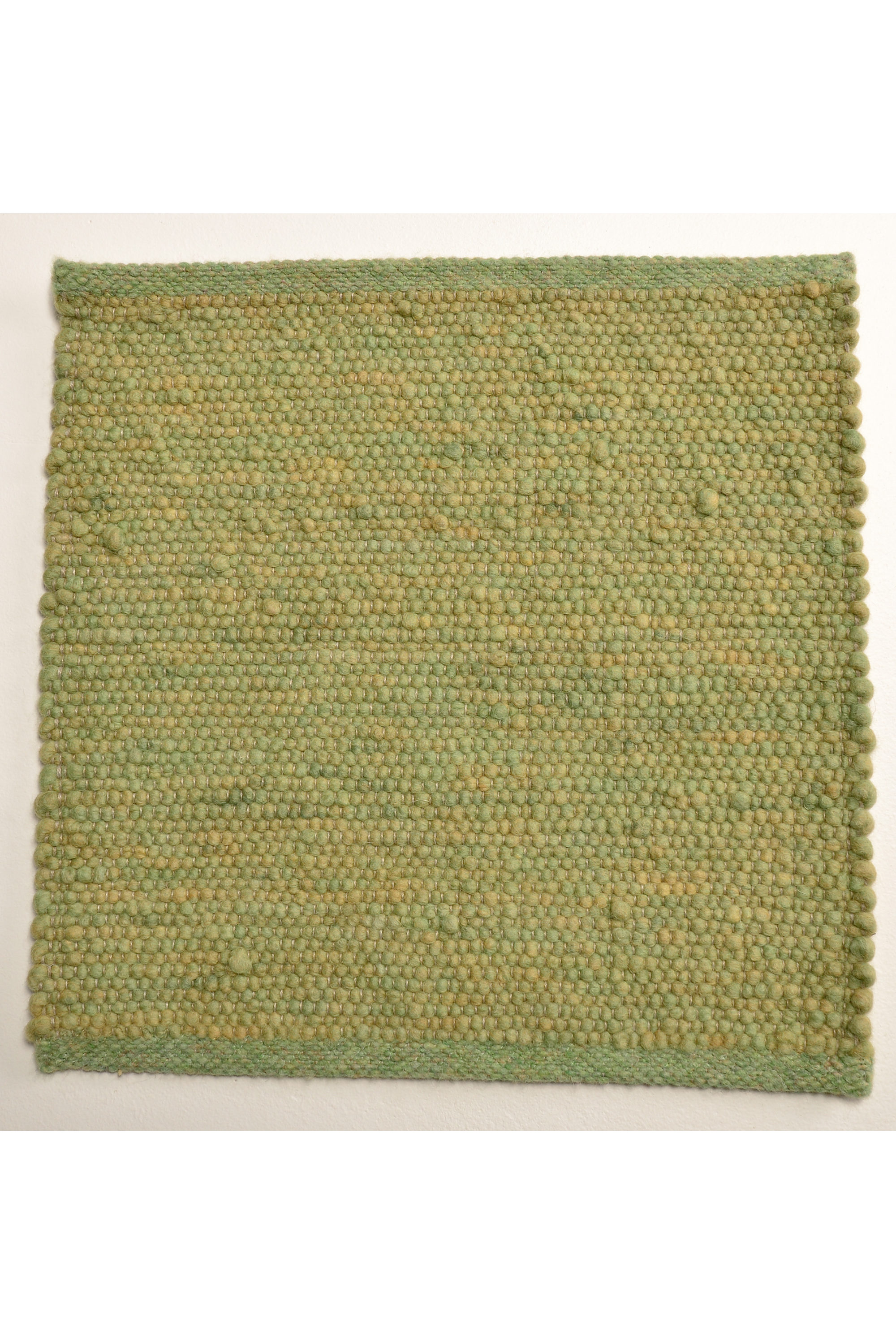 Green luxury plain handwoven rug