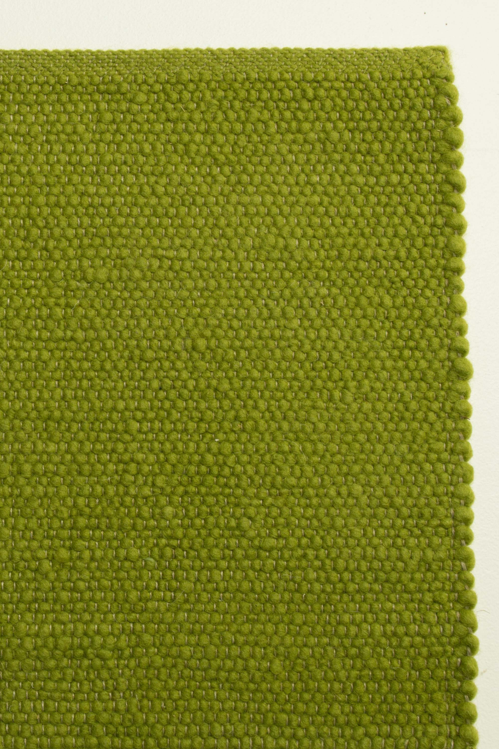 Green luxury plain handwoven rug