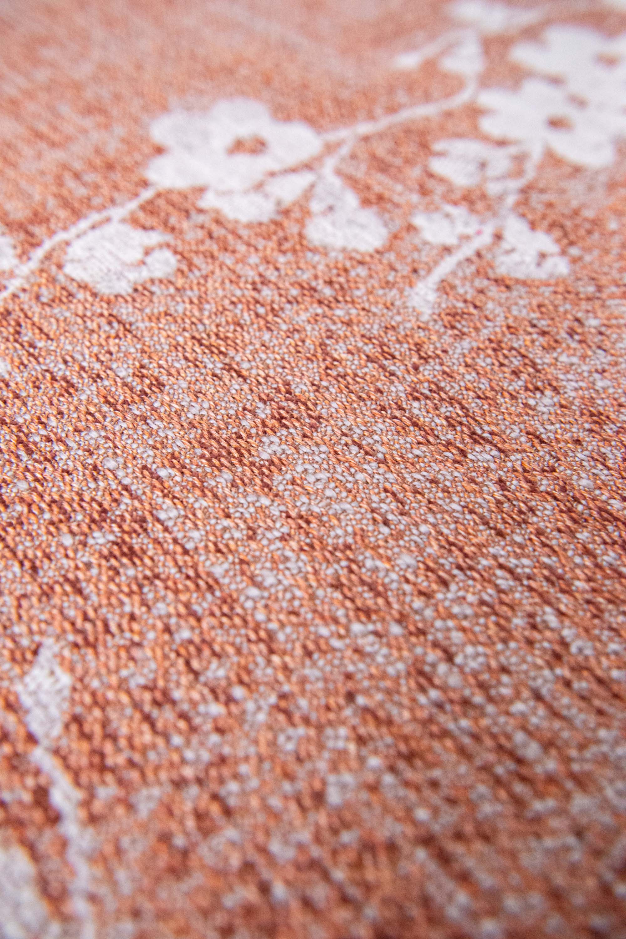 Modern abstract rug with subtle pink floral pattern