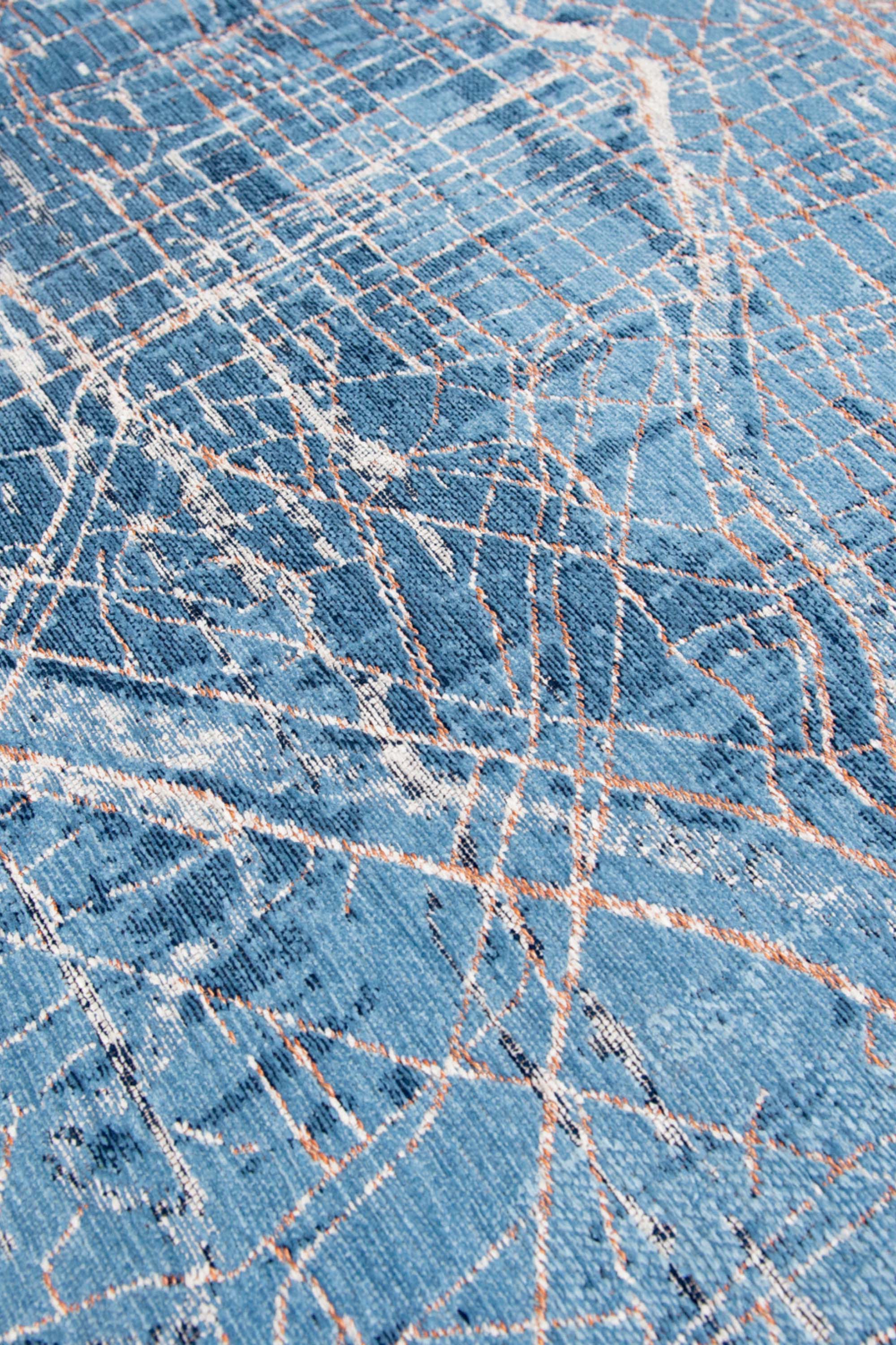 Blue abstract circle rug with a pattern inspired by the map of Tokyo