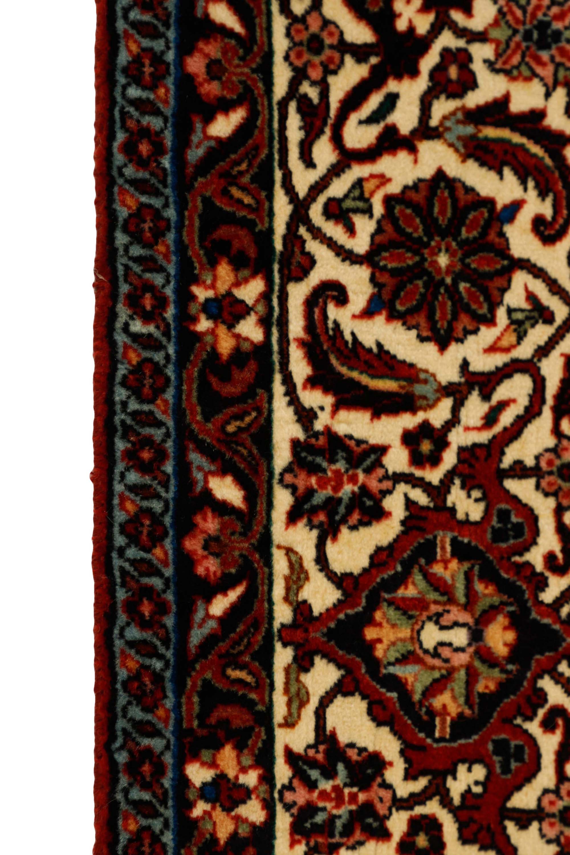 Traditional bordered Bidjar rug in red, cream, and black tones