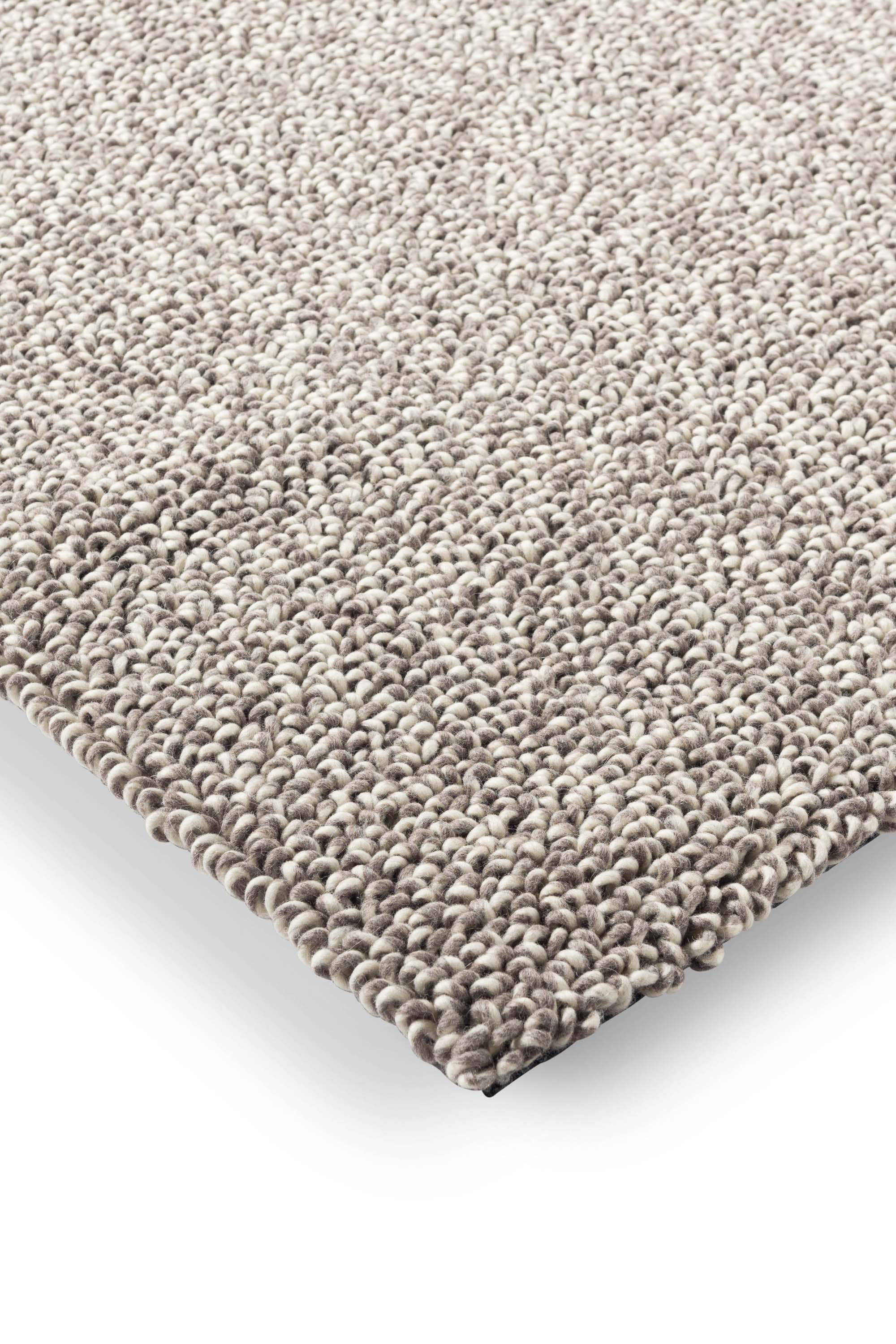 Plain dark grey rug with looped pile