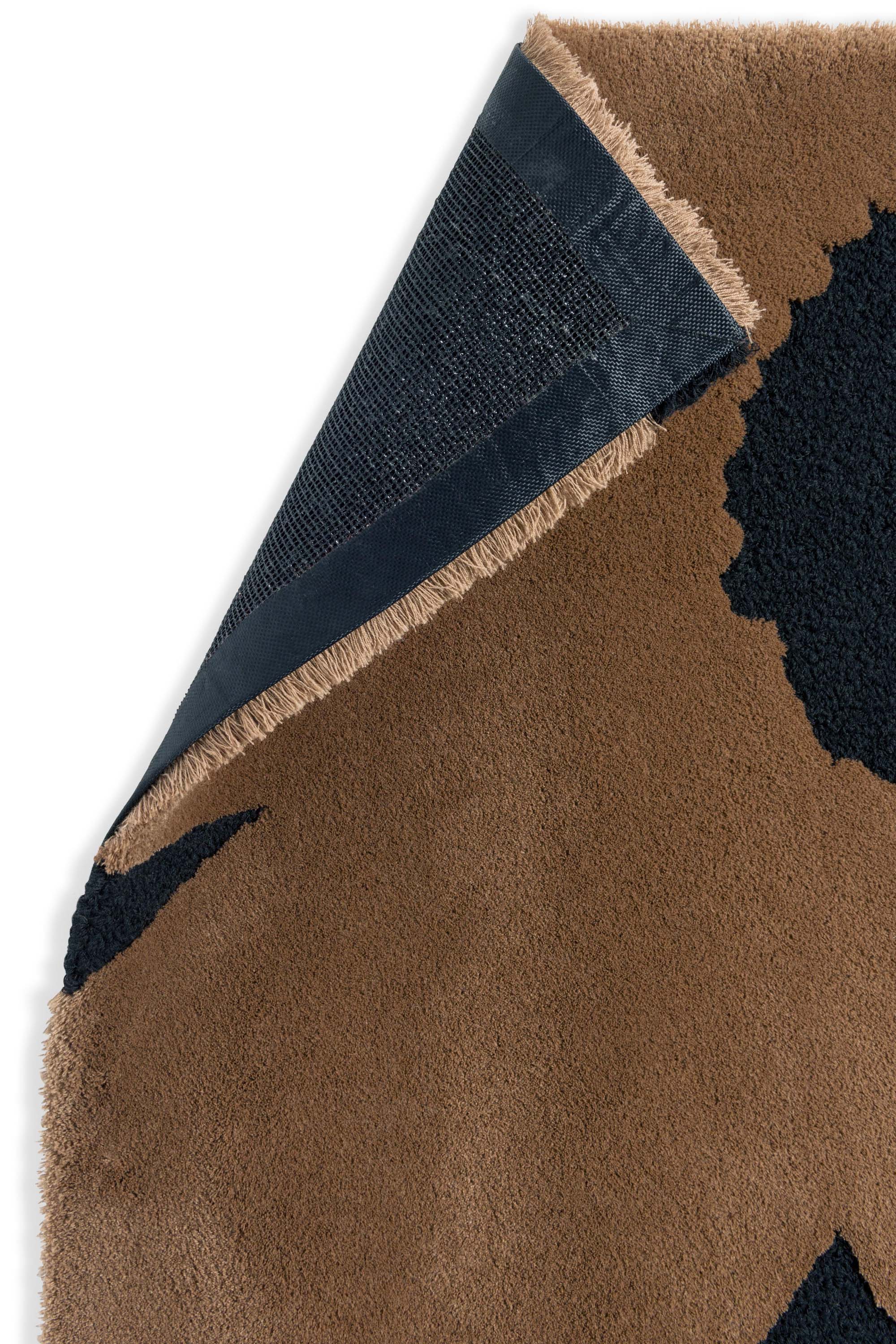 Brown patterned floral rug