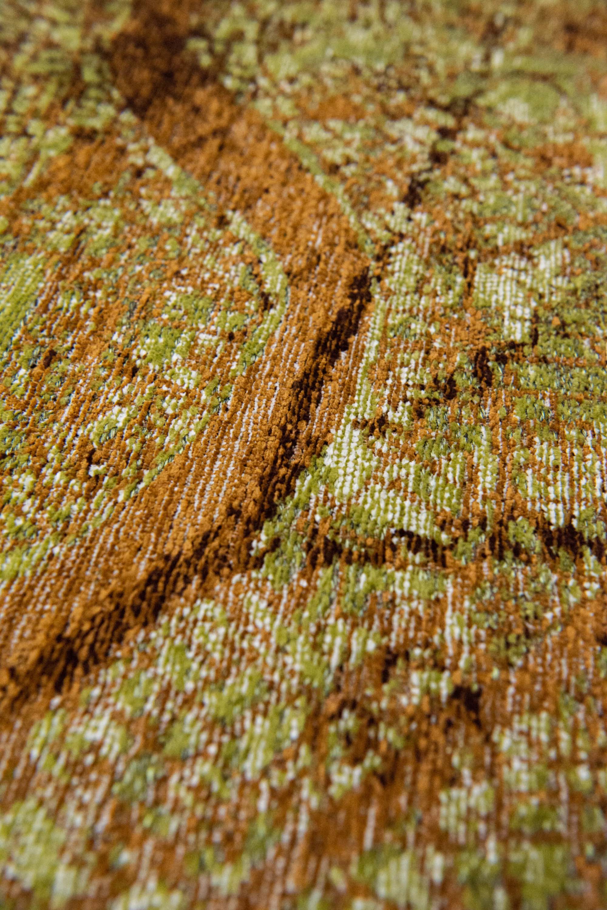 Green abstract rug with a pattern inspired by the map of London