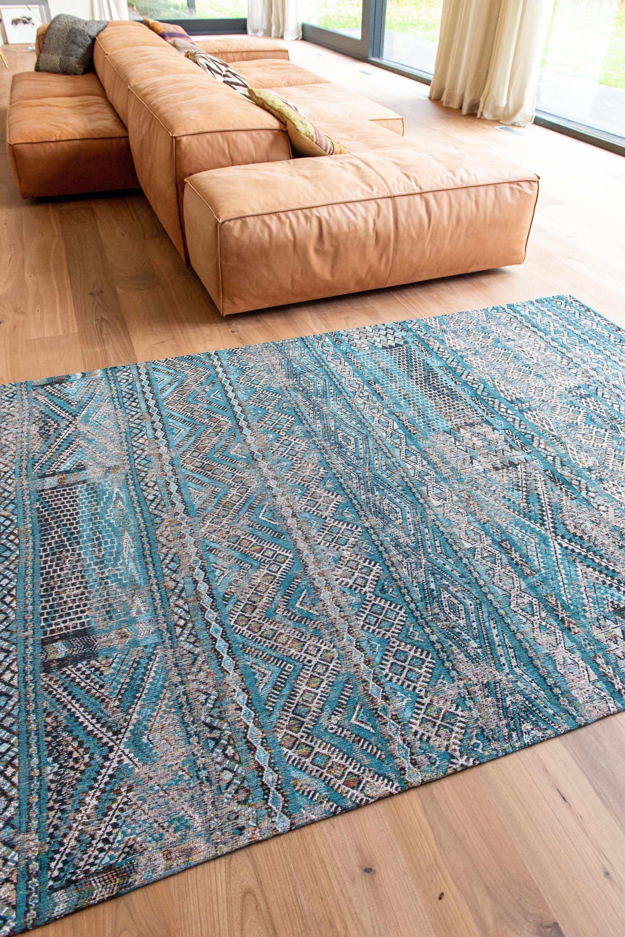 blue rug with a moroccan geometric pattern