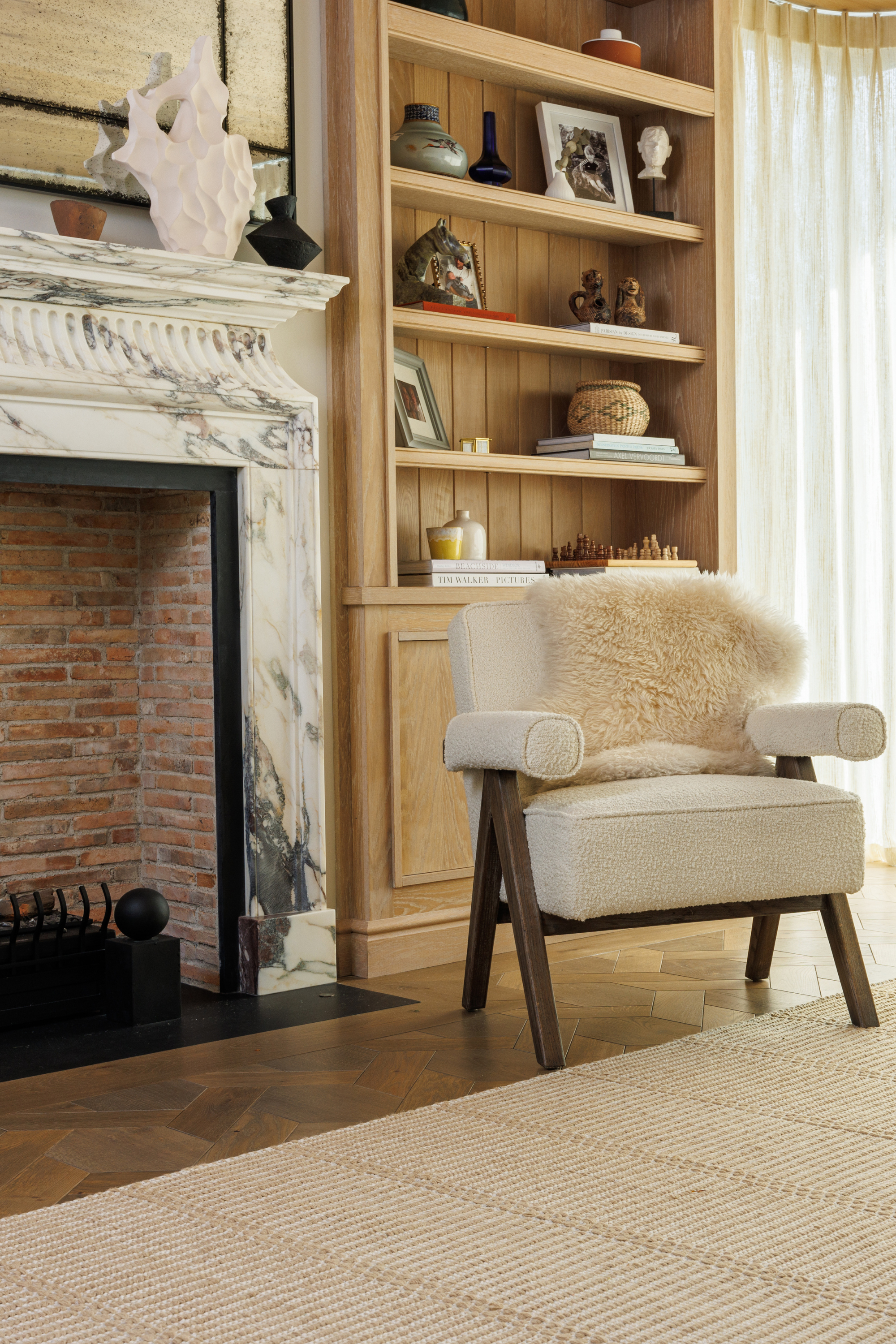 wool and cotton rug in a golden straw tone featuring a design inspired by ancient irish script in a living room