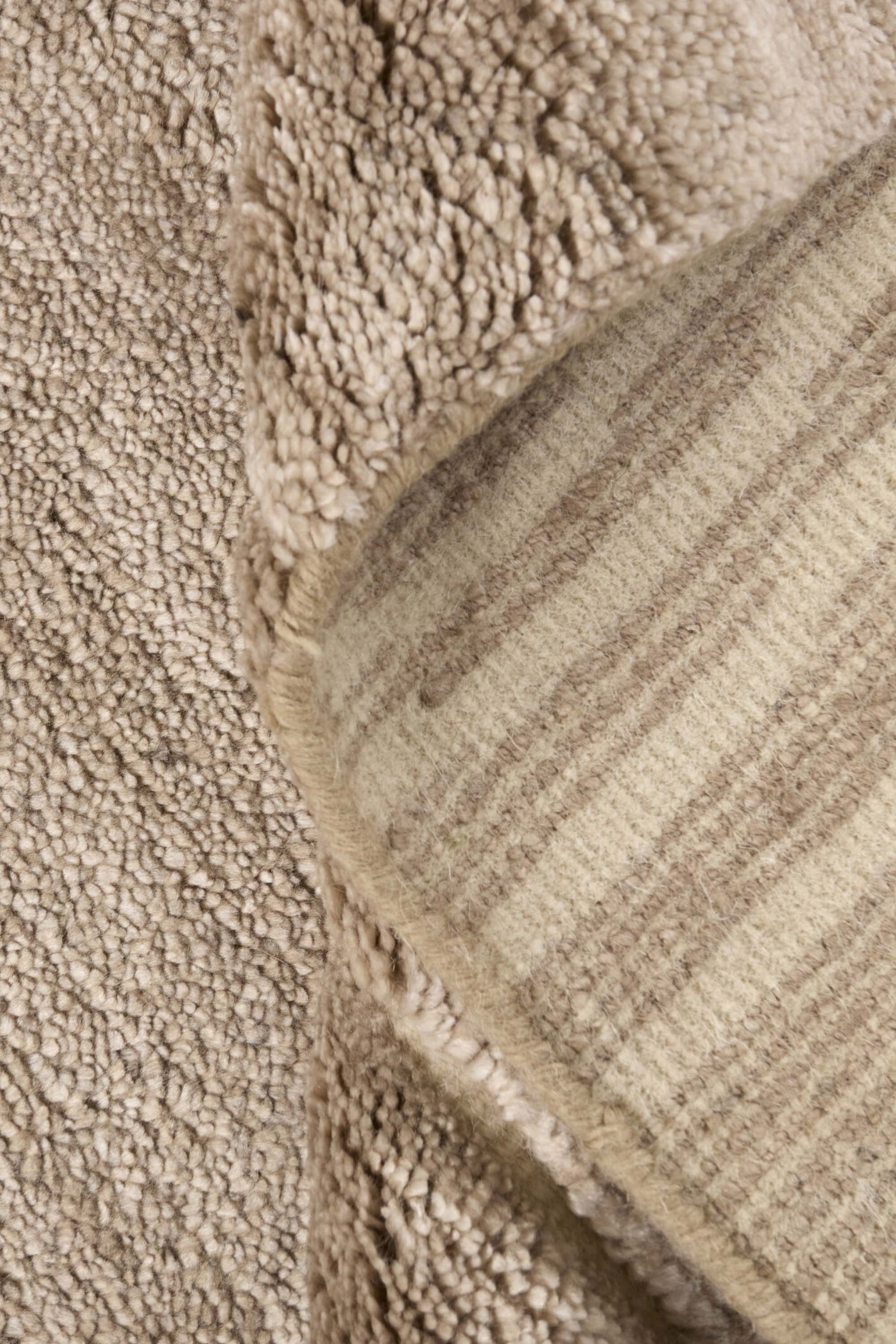 Minimal beige luxury Moroccan style rug