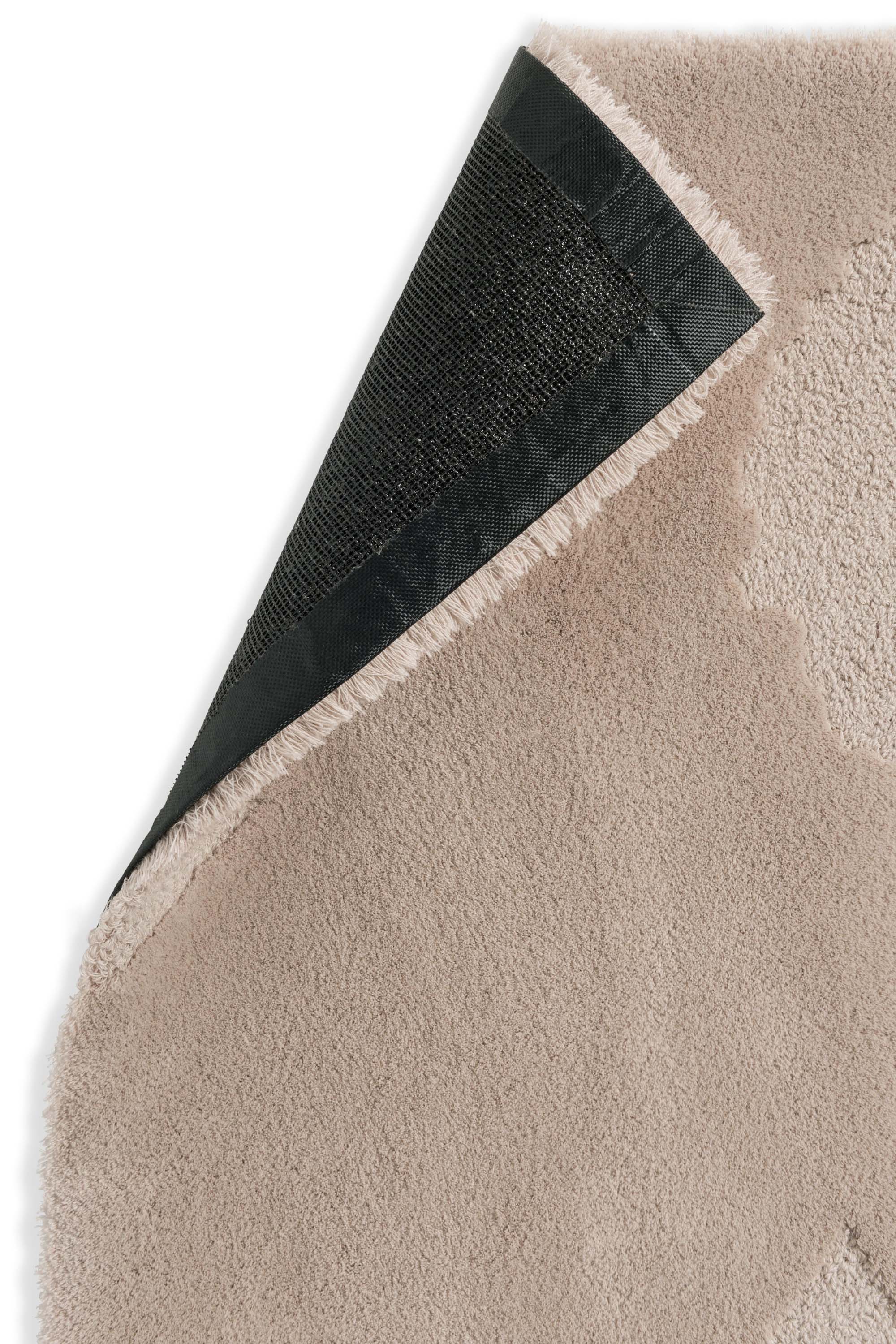 Beige patterned floral rug